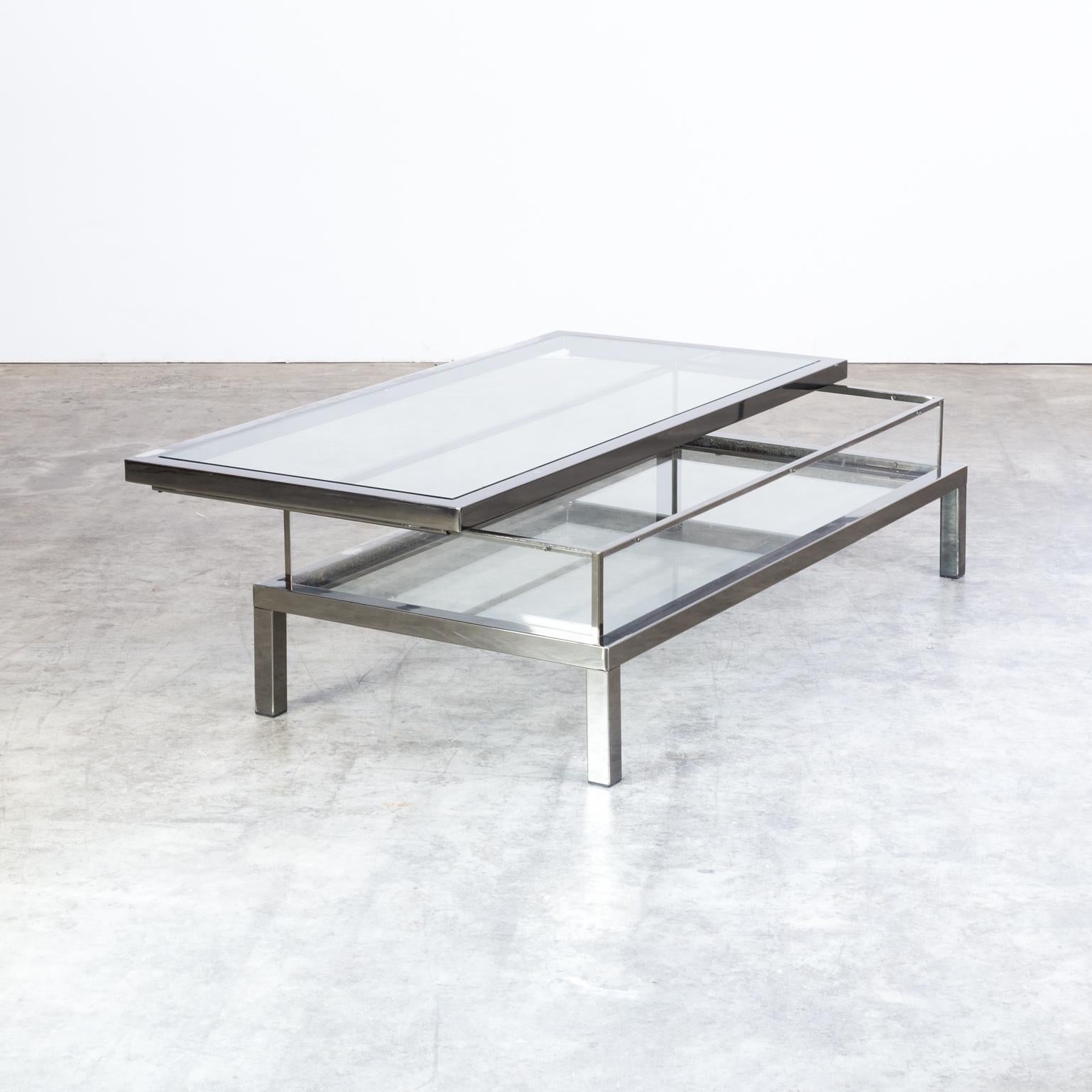 1950s metal and glass French sliding coffee table. Good condition, consistent with age and use.