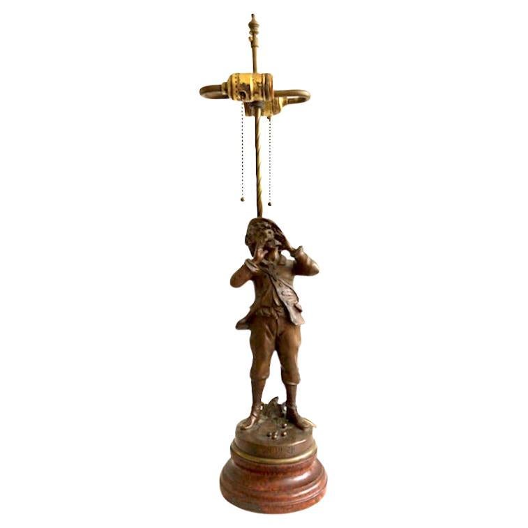 1950s Metal Sculpture Table Lamp Of A Boy Bellowing For Sale