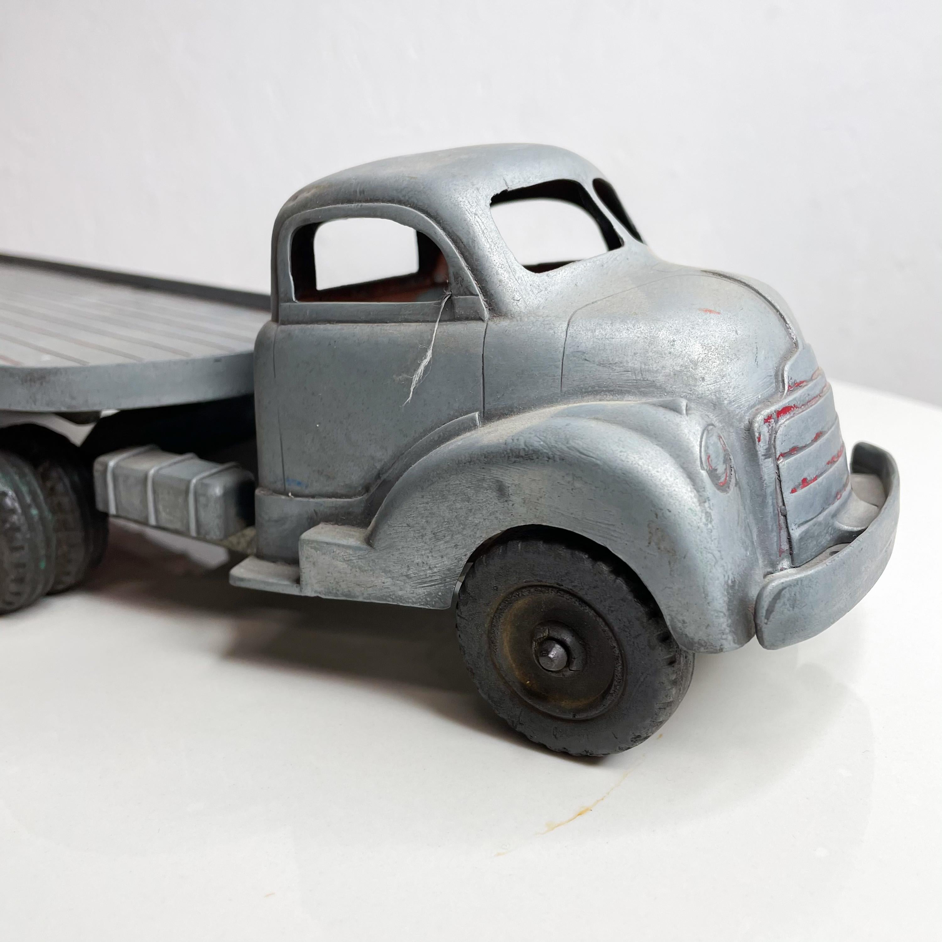 Mid-Century Modern 1950s Metal Toy Truck 14 Wheeler Stake Cargo Loading Open Flat Bed in Gray Matte