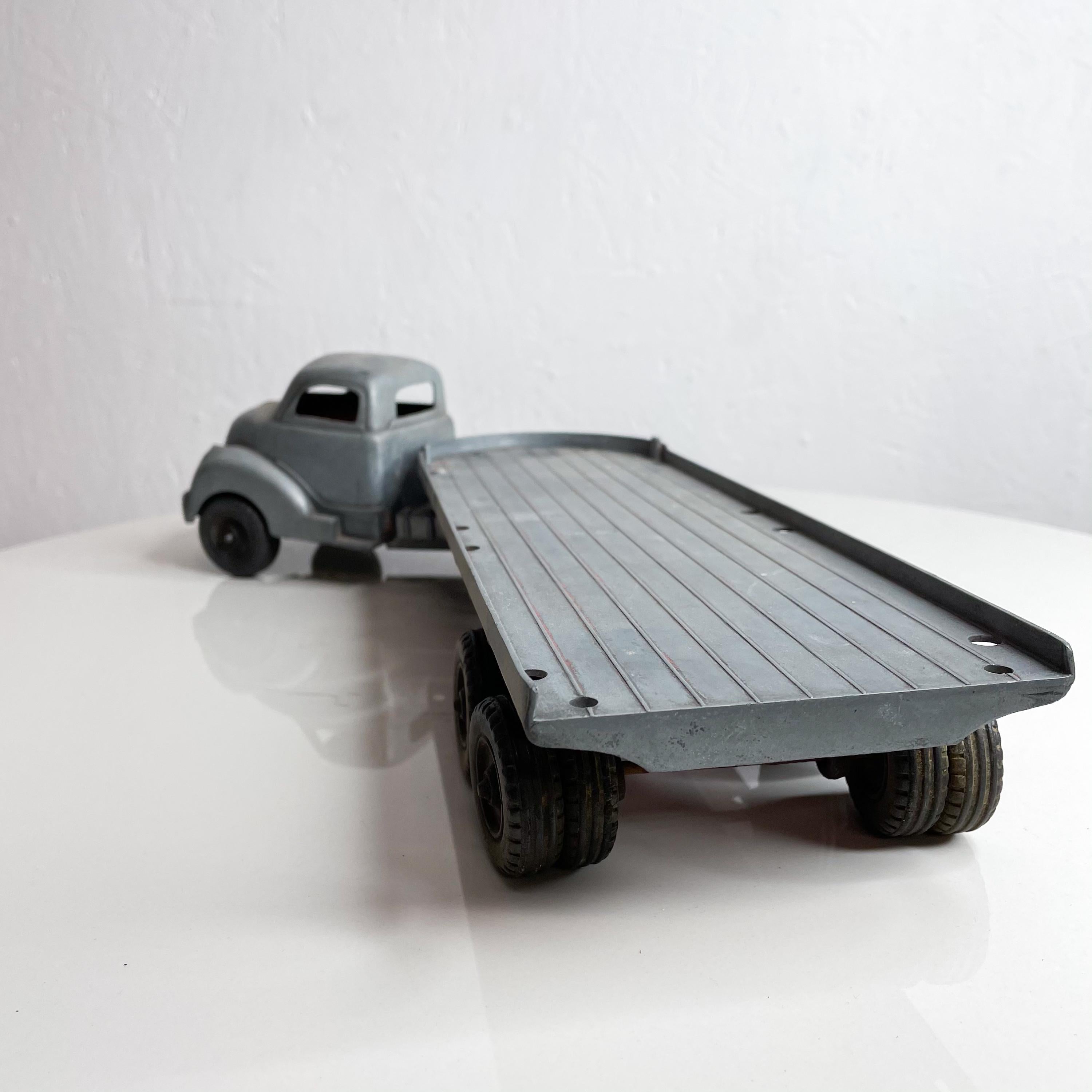 Mid-20th Century 1950s Metal Toy Truck 14 Wheeler Stake Cargo Loading Open Flat Bed in Gray Matte