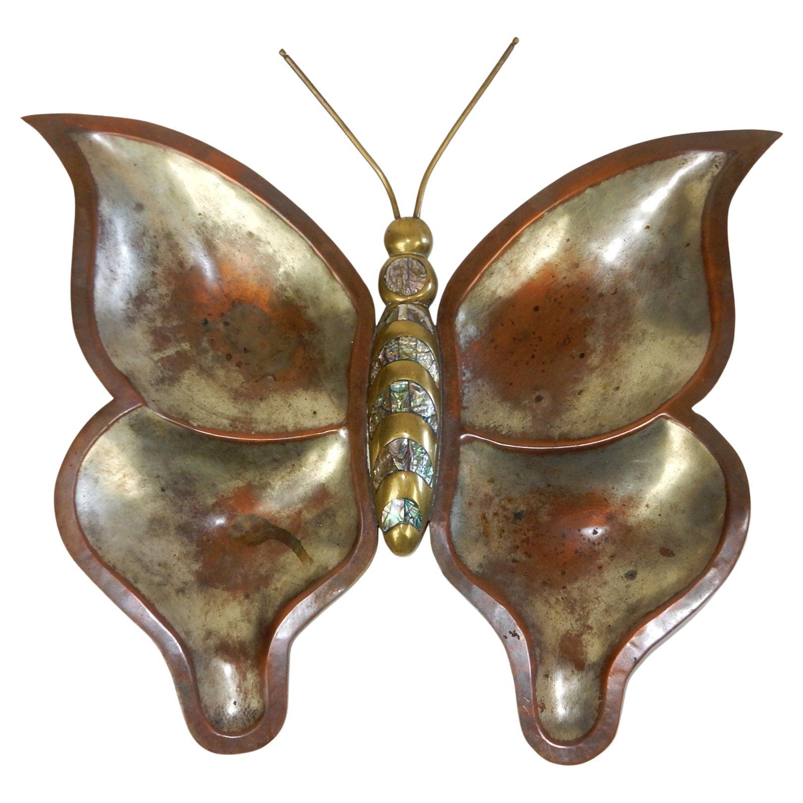 Large decorative butterfly and grasshopper sculpture bowls
from Mexico circa 1950's. In the style of Los Castillo.
Each is signed with makers mark and Mexico.
Formed of copper and brass with inlaid 
Abalone shell. Both are well used but not abused.