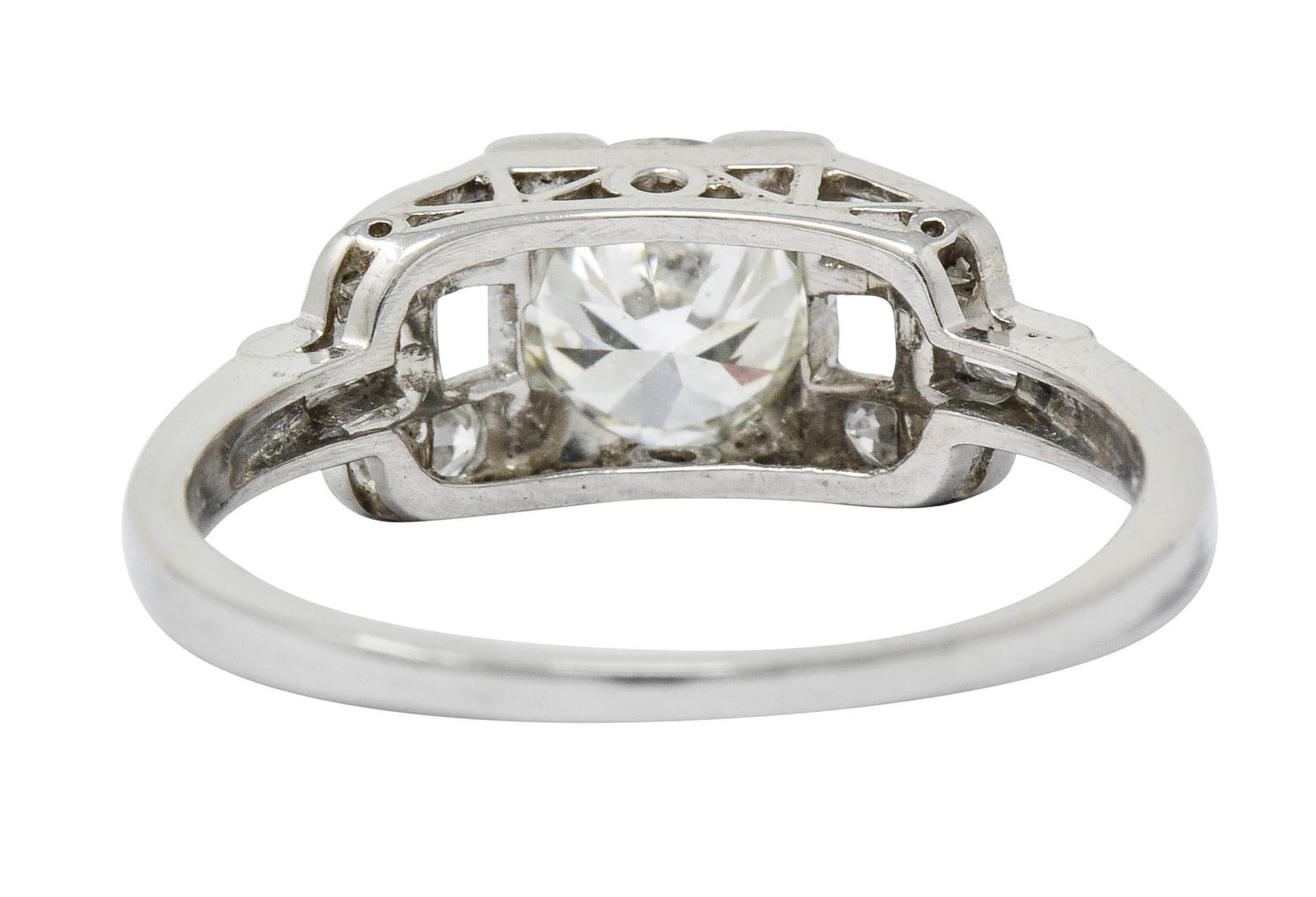 Round Cut 1950's Mid-Century 1.07 CTW Diamond Platinum Buckle Engagement Ring For Sale