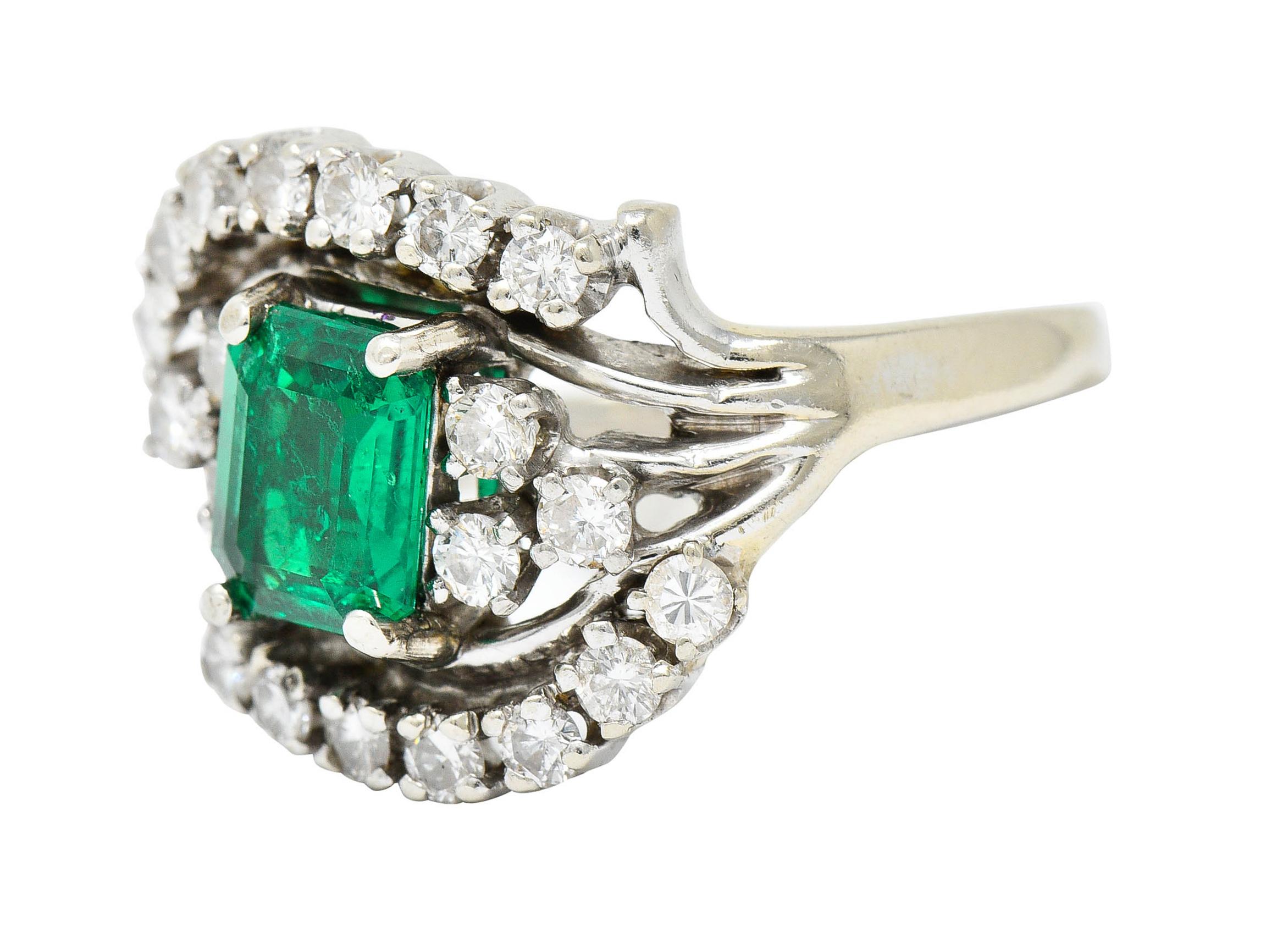 Women's or Men's 1950's Mid-Century 1.59 Carats Emerald Diamond 14 Karat White Gold Bypass Ring For Sale