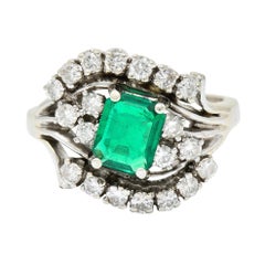 1950's Mid-Century 1.59 Carats Emerald Diamond 14 Karat White Gold Bypass Ring