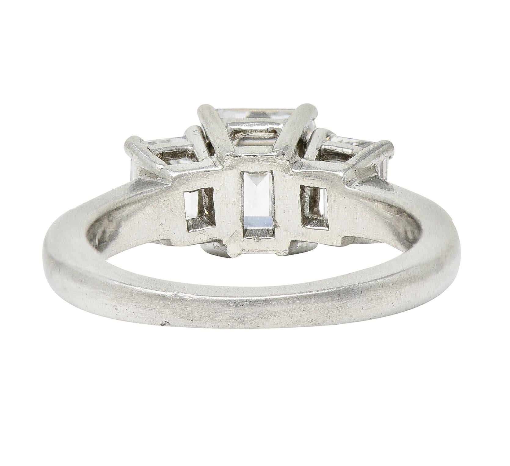 1950's Mid-Century 2.51 Carats Emerald Cut Diamond Platinum Three Stone Ring In Excellent Condition In Philadelphia, PA