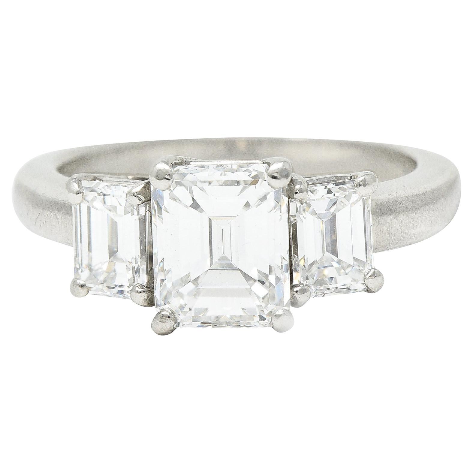 1950's Mid-Century 2.51 Carats Emerald Cut Diamond Platinum Three Stone Ring