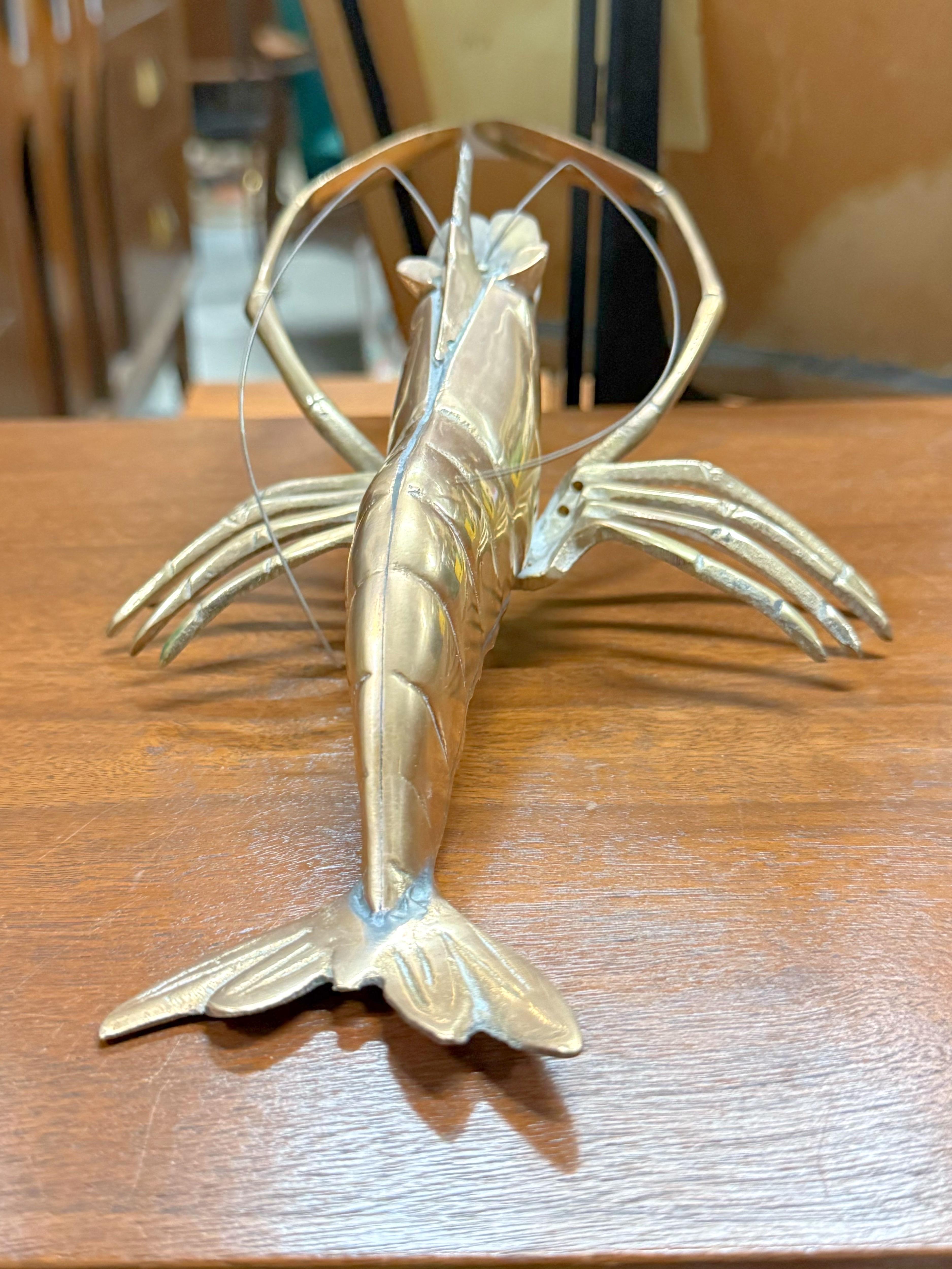 Midcentury brass lobster, circa 1950s.  This can be hung on the wall or placed on a surface.  Very detailed.