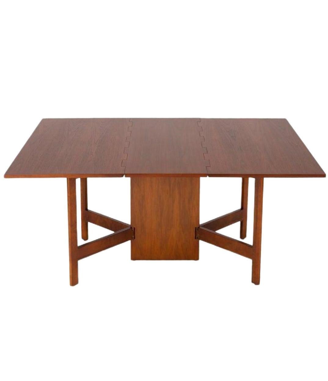 1950s Mid Century George Nelson for Herman Miller gate leg dining table

George Nelson Vintage 1950s Walnut Gate Leg Dining Table By Herman Miller.

George Nelson Designed This Table For Herman Miller In The 1950s With A Special Wide Wood Hinge