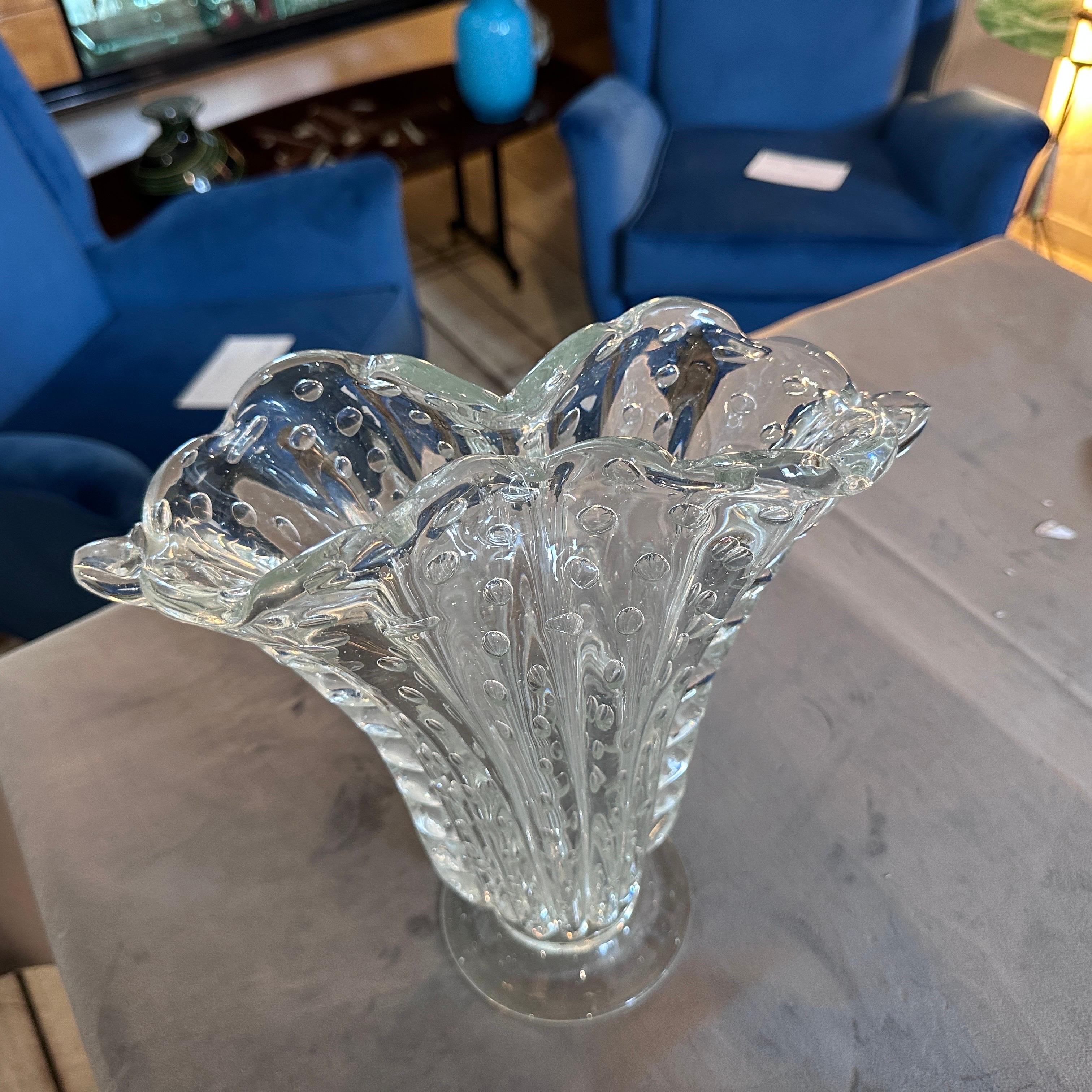 A transparent Murano glass vase designed and manufactured in Venice by Barovier in the fifties, it's in very good condition. The vase by Barovier is a stunning piece of art glass that showcases the mastery of Murano glassmaking and the iconic style
