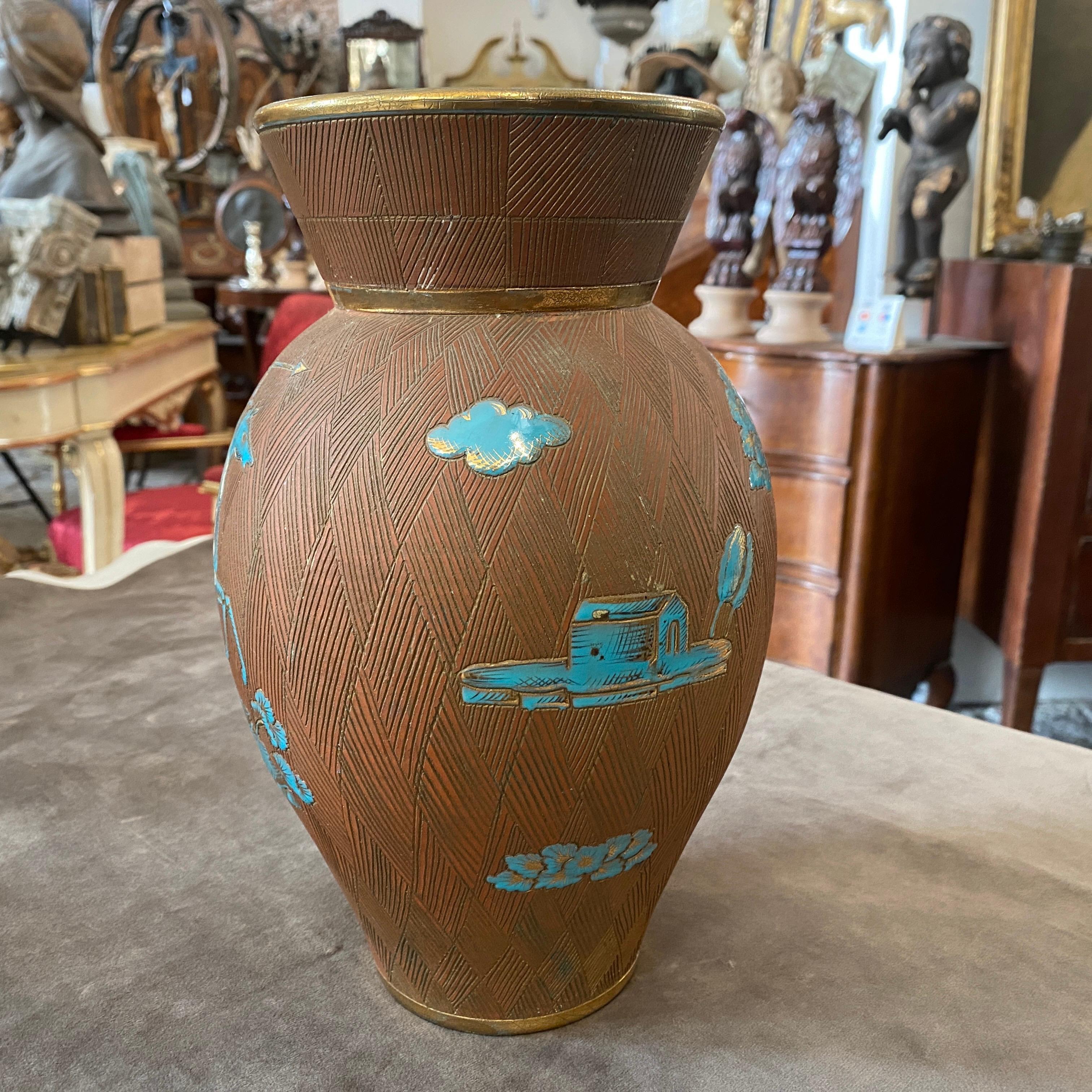 An hand painted turquoise and brown ceramic designed and hand-crafted by Ceramiche Fantechi of Sesto Fiorentino, it's made in Italy in the 1950s. Labeled on the bottom. This Vase by Fantechi is a striking example of Italian craftsmanship and