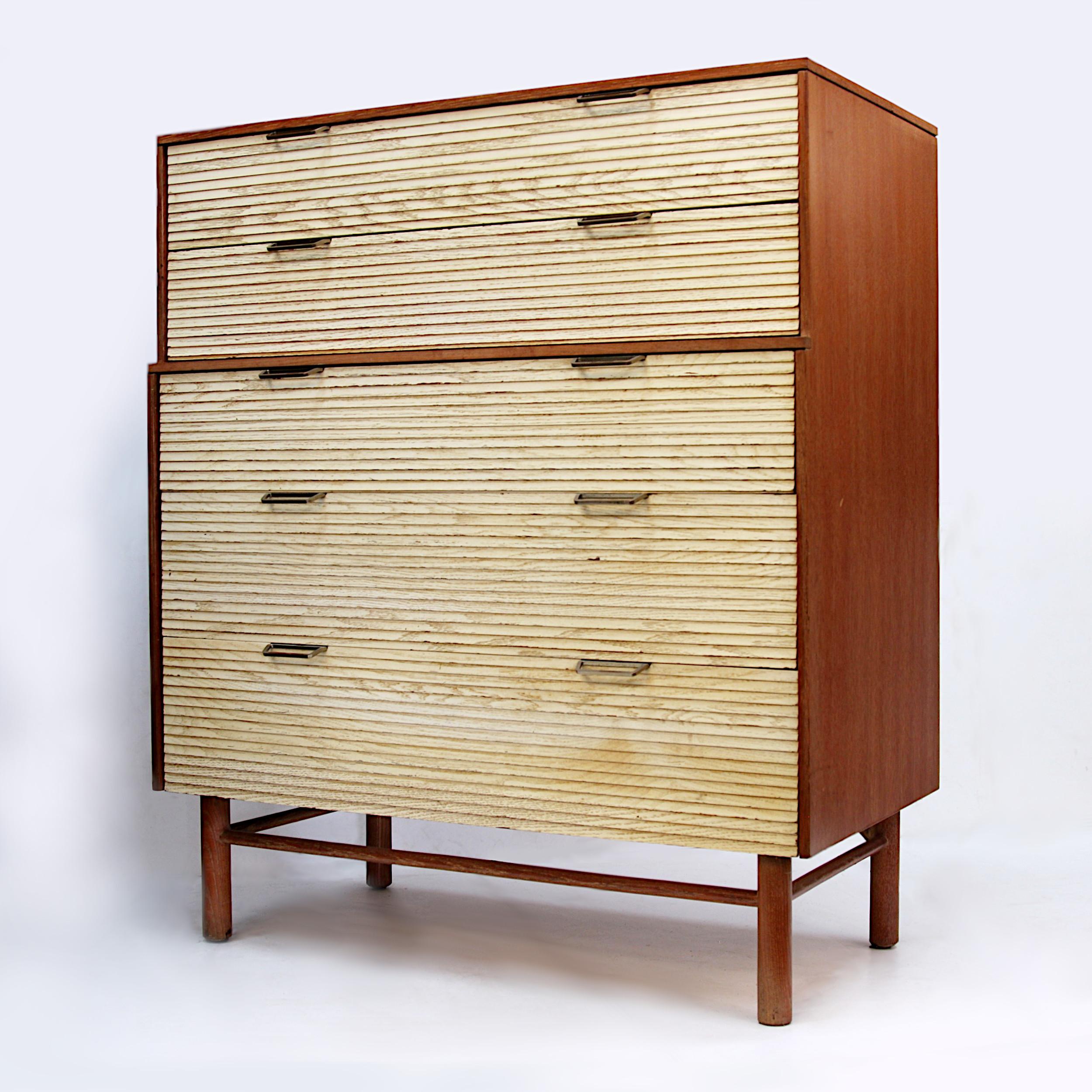 Very nice, original piece from one of the most iconic Industrial designers of the 20th century! Dresser features cerused oak case, 5 louvered-front white-washed drawers, and nickel-plated hardware. White drawer fronts contrast beautifully with