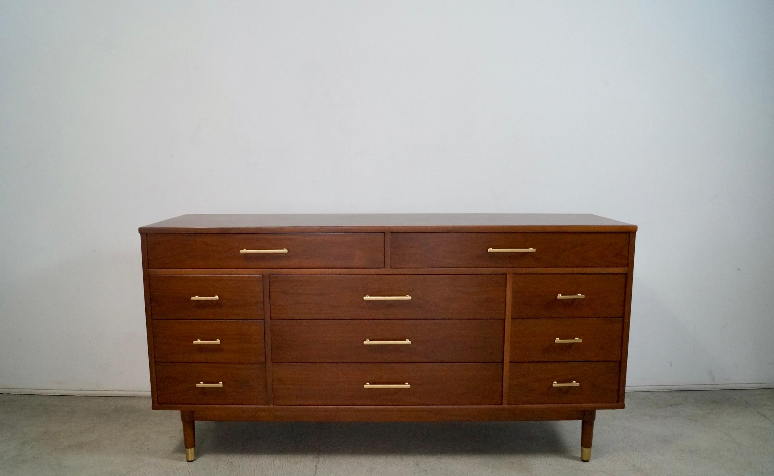 Vintage Midcentury Modern dresser for sale. Manufactured by Drexel in the 1956, and is part of the Biscayne series. It has been professionally restored, and is immaculate. It has 11 total drawers and offers lots of storage. It's a high-quality piece