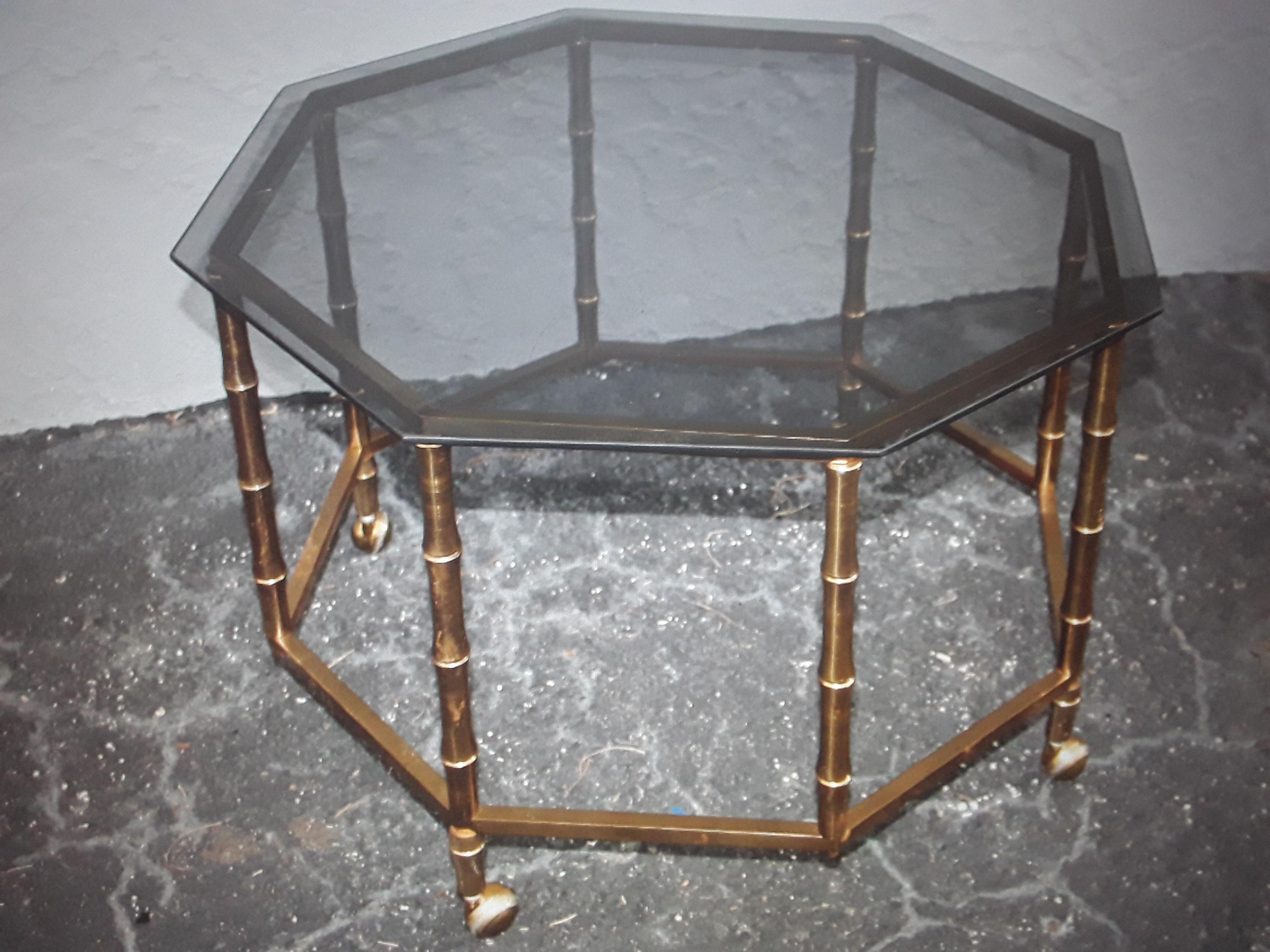 1950's Mid Century Modern Faux Bamboo Gilt Metal Coffee Table with Smoked Glass top. Very lovely table!.