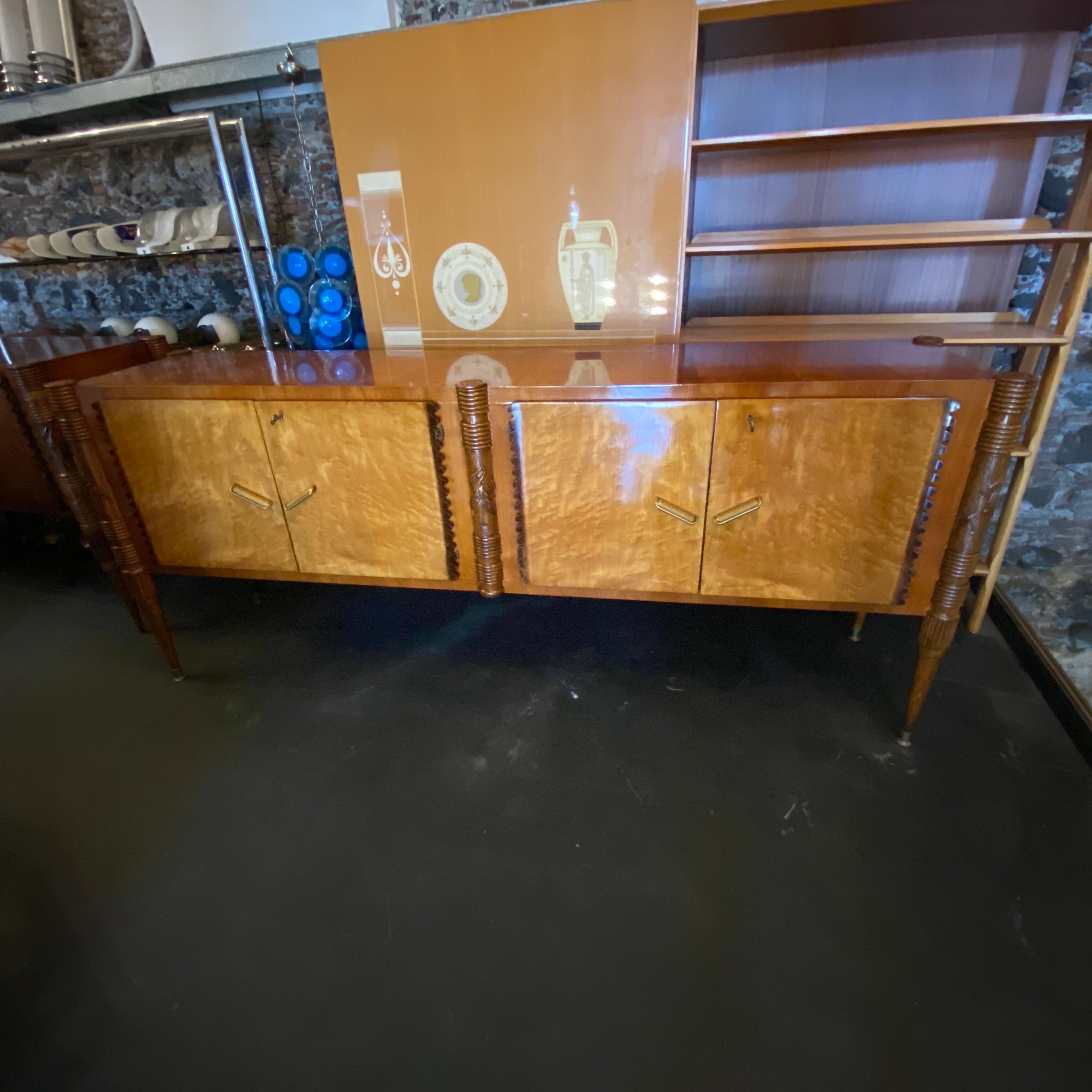 This Large Sideboard by Pier Luigi Colli is an exquisite and iconic piece of furniture that exemplifies the craftsmanship and design aesthetics of the mid-20th century. Pier Luigi Colli, an esteemed Italian designer was known for his mastery in