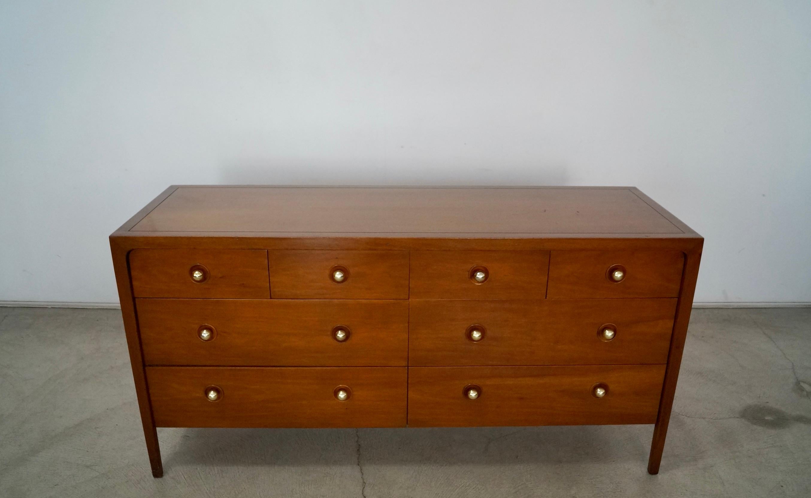 Vintage Mid-century Modern designer dresser for sale. Designed by John Van Koert for Drexel in 1956, and is part of the Counterpoint series by Koert. Very beautiful and rare dresser with a lot of storage. It has eight drawers, and has the label on a