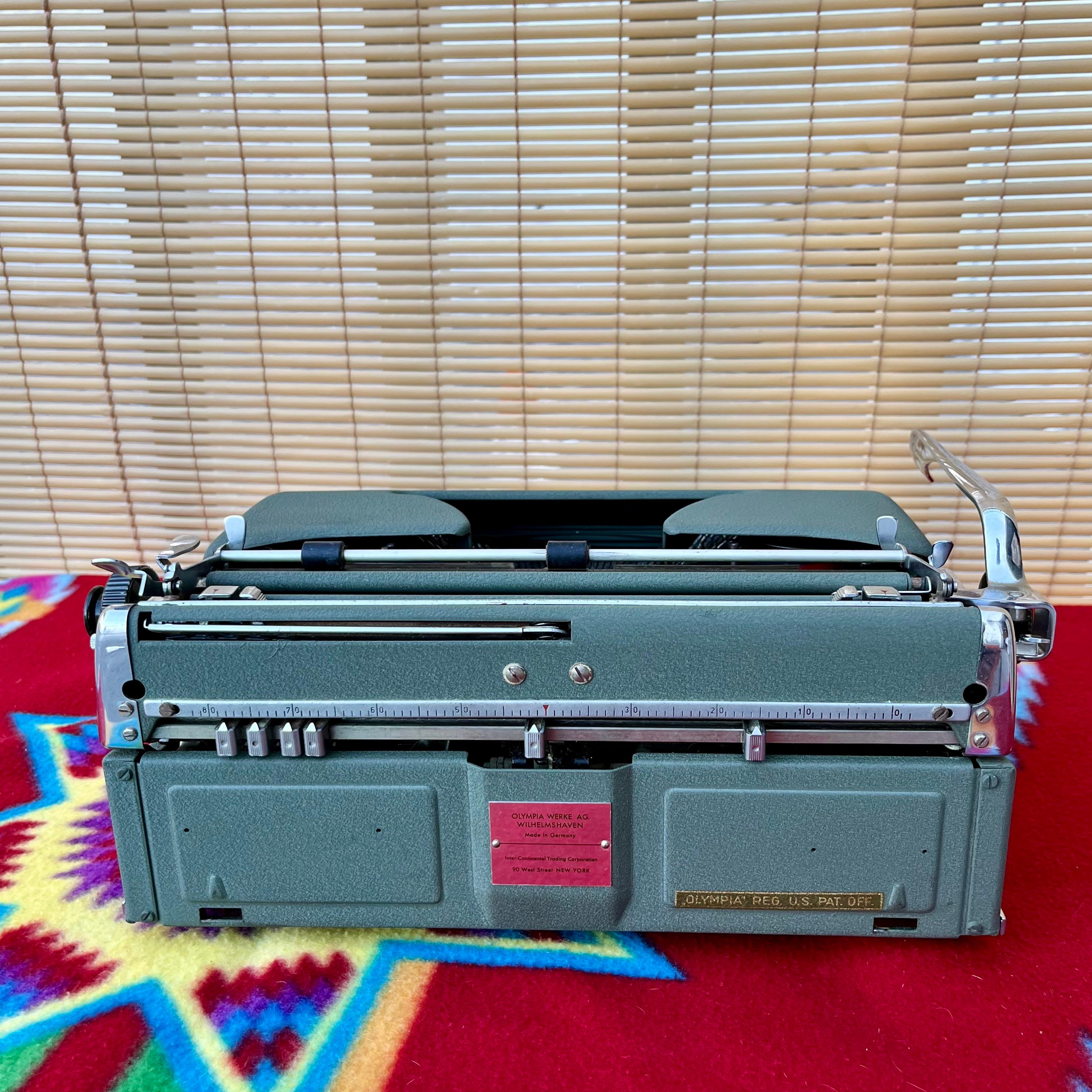 Mid-20th Century 1950s Mid-Century Modern Olympia Sm-3 Portable Typewriter with Case For Sale