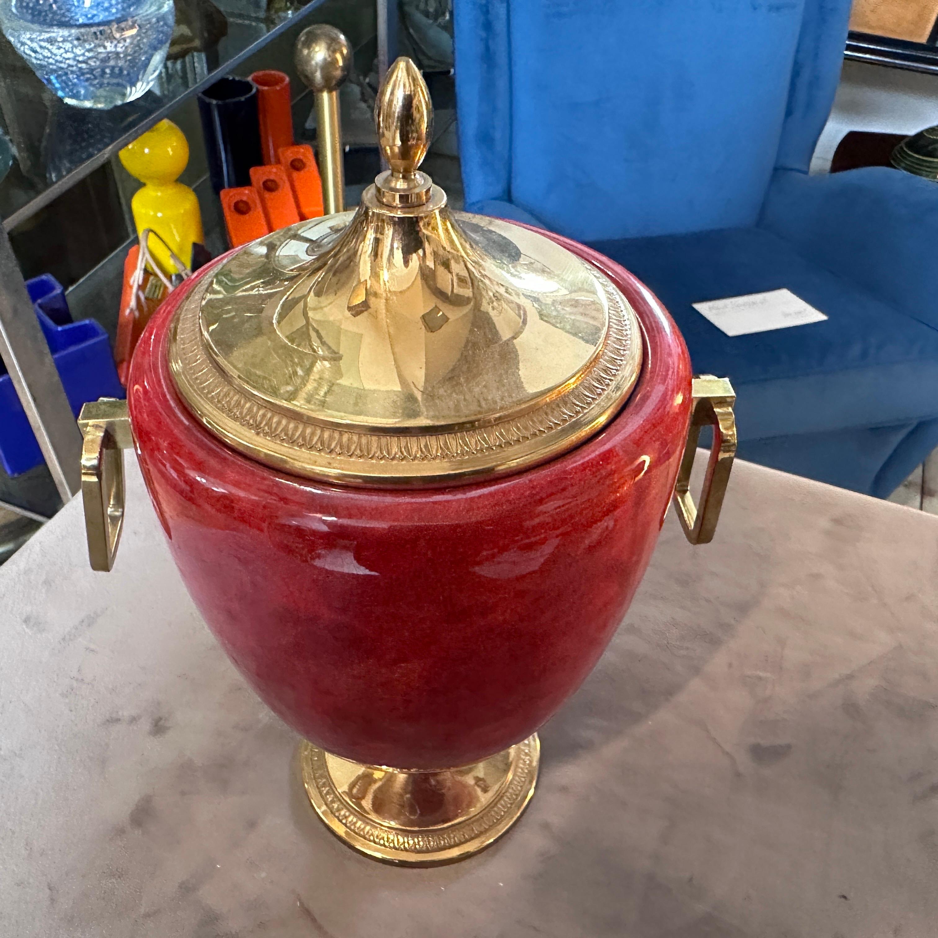 A perfect condition goatskin and brass ice bucket designed and manufactured in Italy by Aldo Tura.
The 1950s was a significant period for Mid-Century Modern design, known for its clean lines, organic forms, and innovative use of materials. One