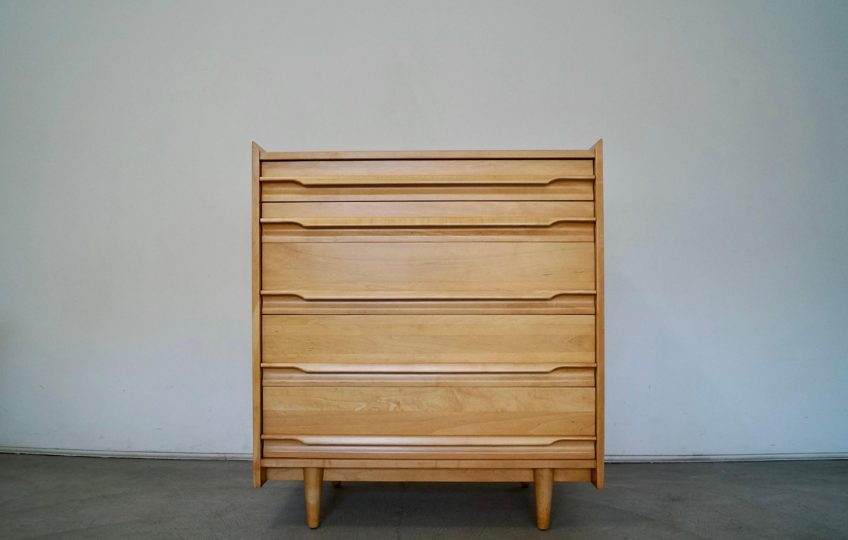 Vintage 1950's Midcentury Modern dresser for sale. Manufactured by Crawford Furniture, and made of solid maple. It has been professionally refinished, and looks immaculate. It has five drawers that are dovetailed on both ends, and is a really