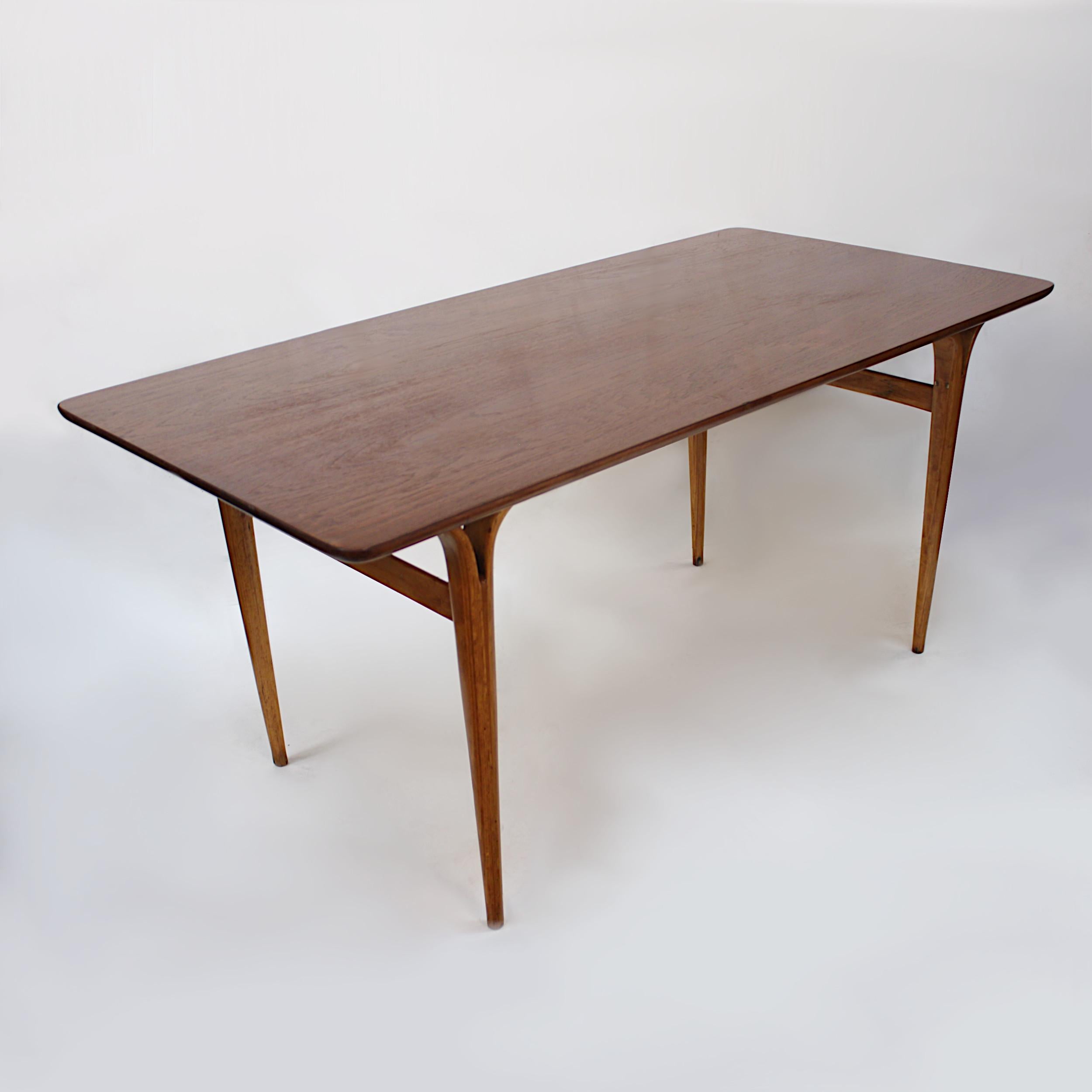 Wonderful 'Table with Cleft Legs' by Bruno Mathsson for Firma Karl Mathsson. Table features teak veneer top, solid bentwood beech legs with that wonderful cleft design, and unique size. This same table is part of the permanent Architecture and
