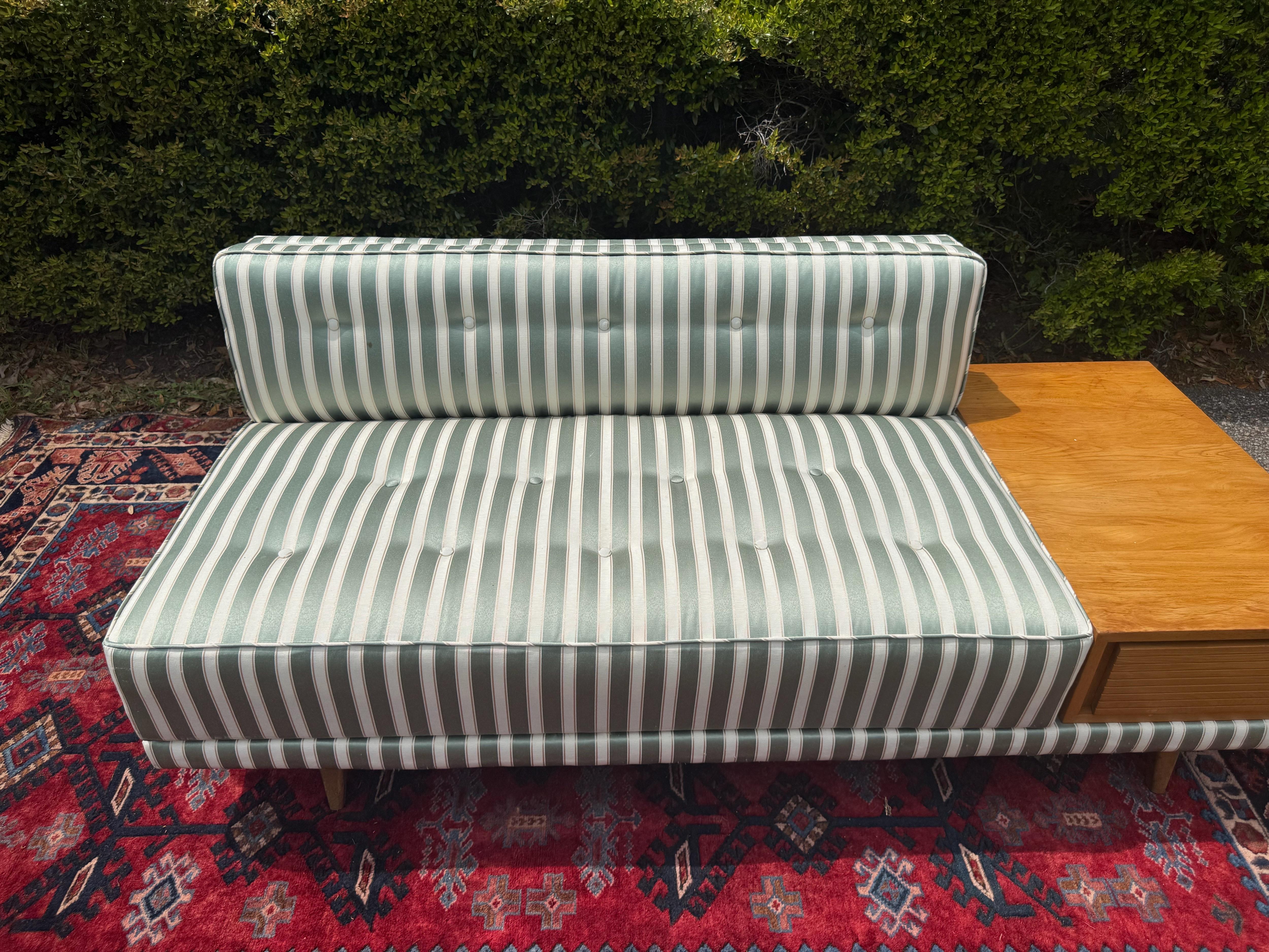 This European mid-century modern Chaise is beautifully upholstered in a green and cream silk blend fabric.   I believe this might be a much earlier version of the 