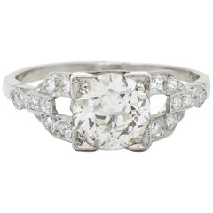 1950s Midcentury 1.25 Carat Diamond Platinum Buckle Engagement Ring GIA