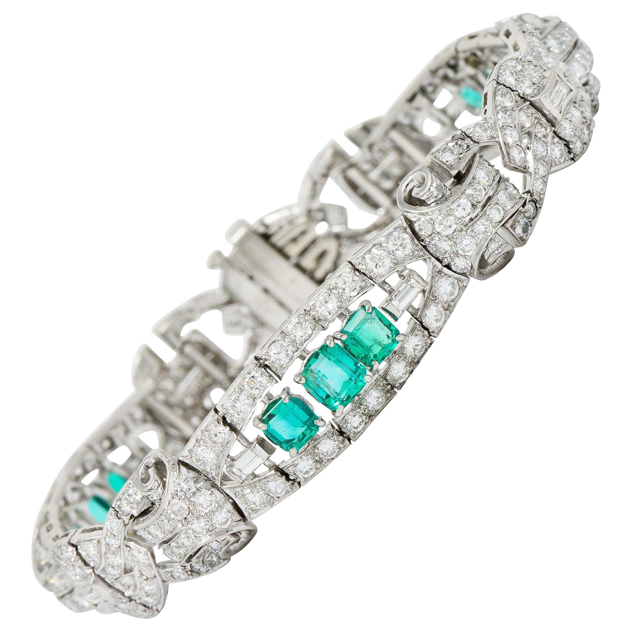 1950s Midcentury 9.55 Carat Emerald Diamond Platinum Scrolled Link Bracelet