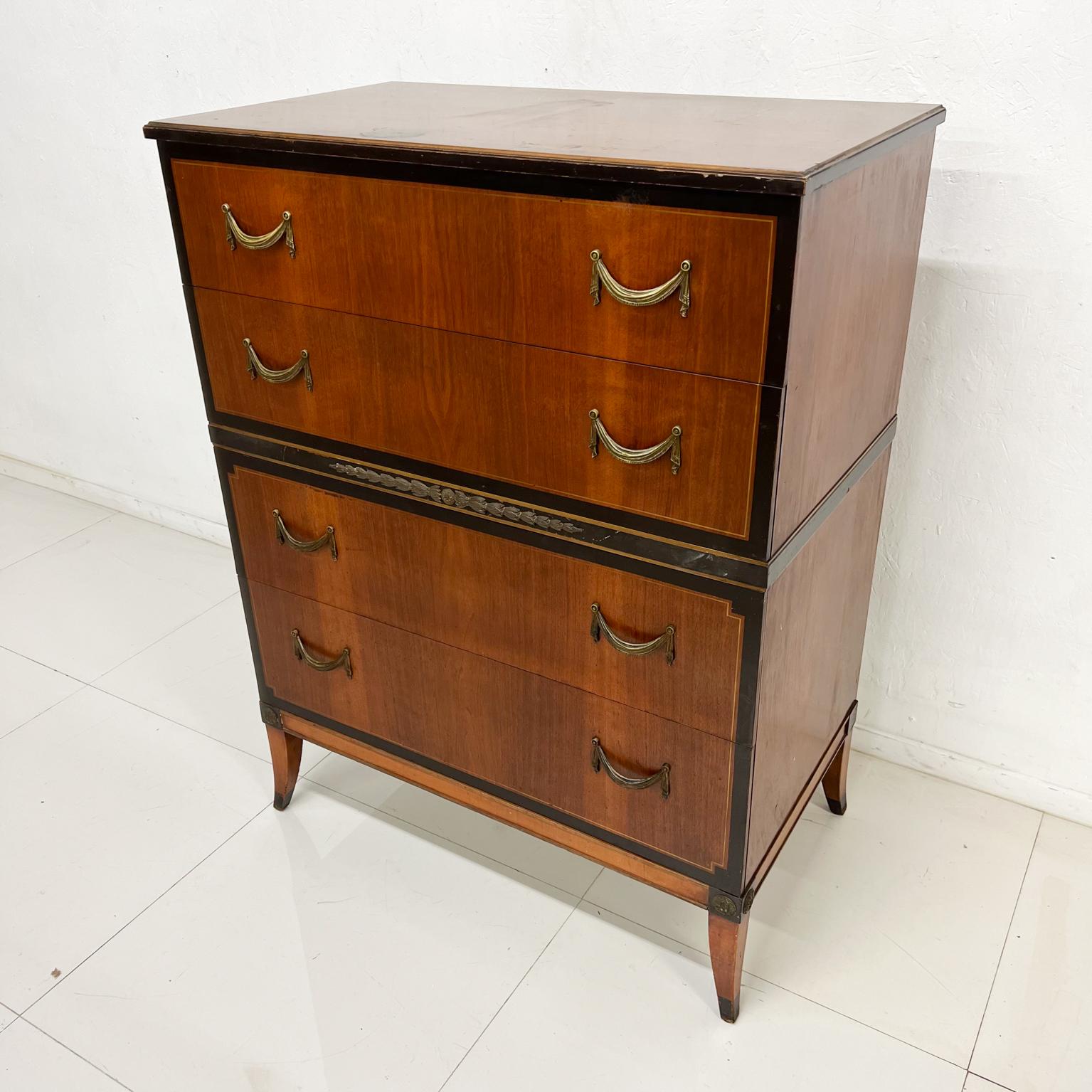 1950s Mid-century elegant Landstrom Furniture highboy dresser Illinois
Vintage Landstrom chest of drawers. Fair condition.
Original vintage unrestored condition. Top has some water stains. 
Finish has some wear.
Neoclassical lines original brass