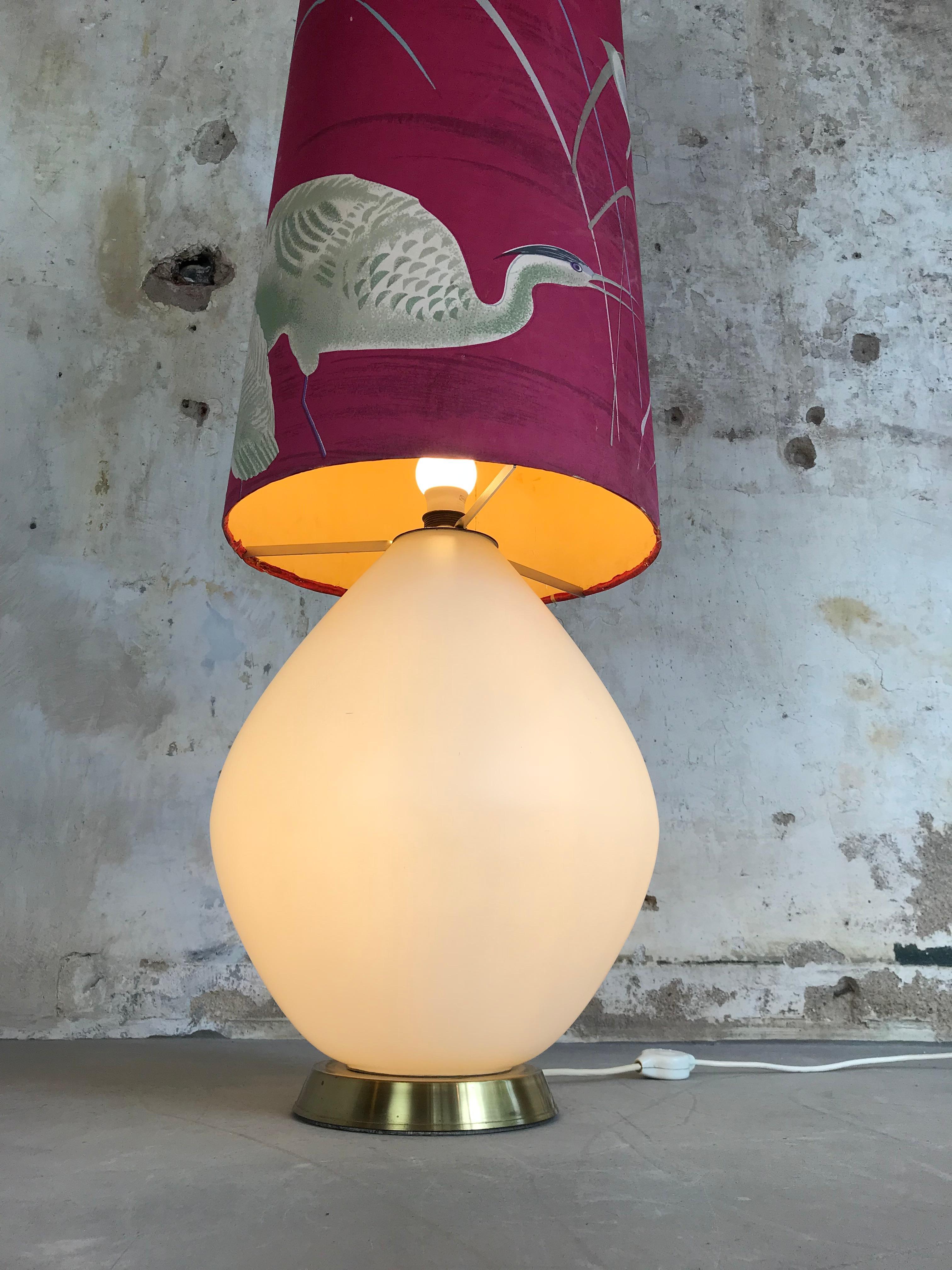 Expressive large vintage floor lamp from France, 1950s. Very nice brass base combined with opaline glass. One light in the glass bottom and one light under the shade. Original version with original shade, original wiring and original three-way