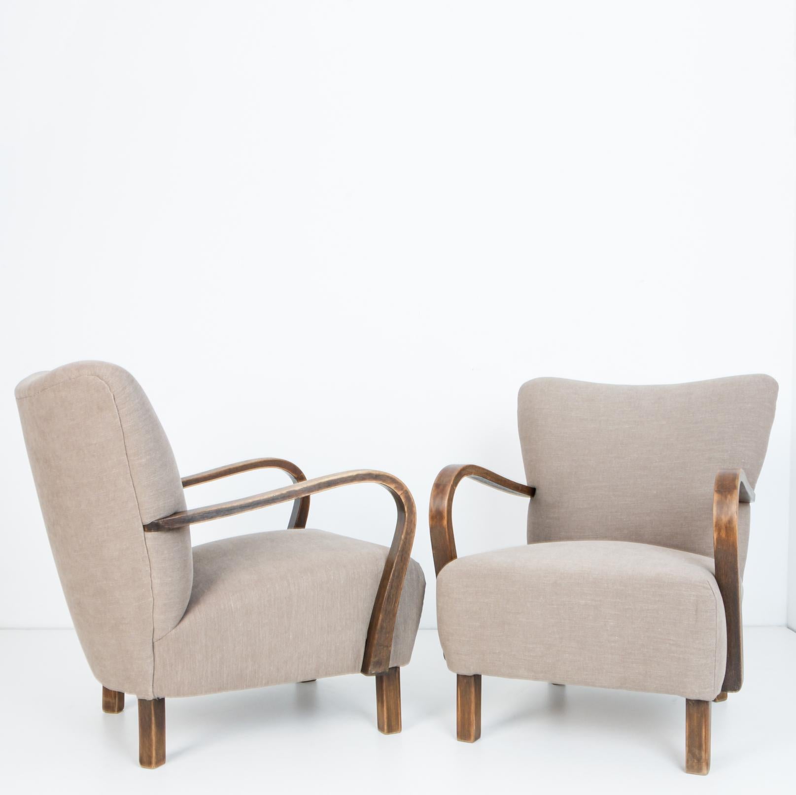 Mid-20th Century 1950s Midcentury Lounge Chairs, a Pair