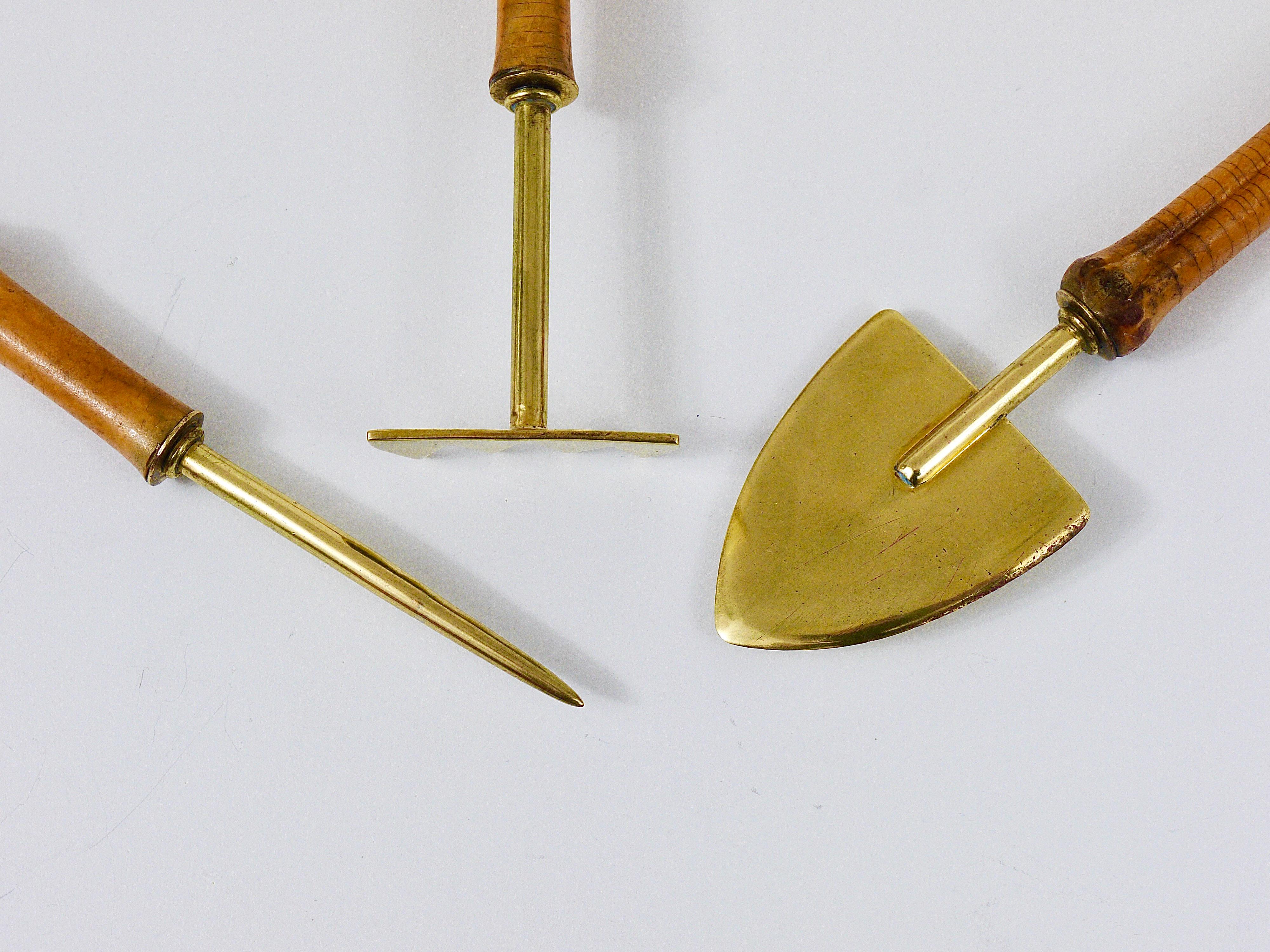 A beautiful set of gardening tools, made brass and bamboo. Consists of a rake, a shovel and a skewer. Handmade in the 1950s in Austria. To be used for cacti and other indoor plants and also a decorative addition to your plants and flower pots. In