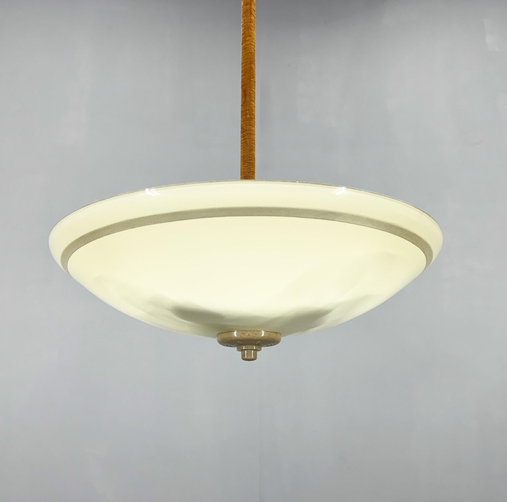 Mid-century opaline glass pendant light by VEB Leuchtenbau Arnsdorf. Manufactured in Germany in the 1950s. 
Bulb: 1 x E27 (E26). US wiring compatible.