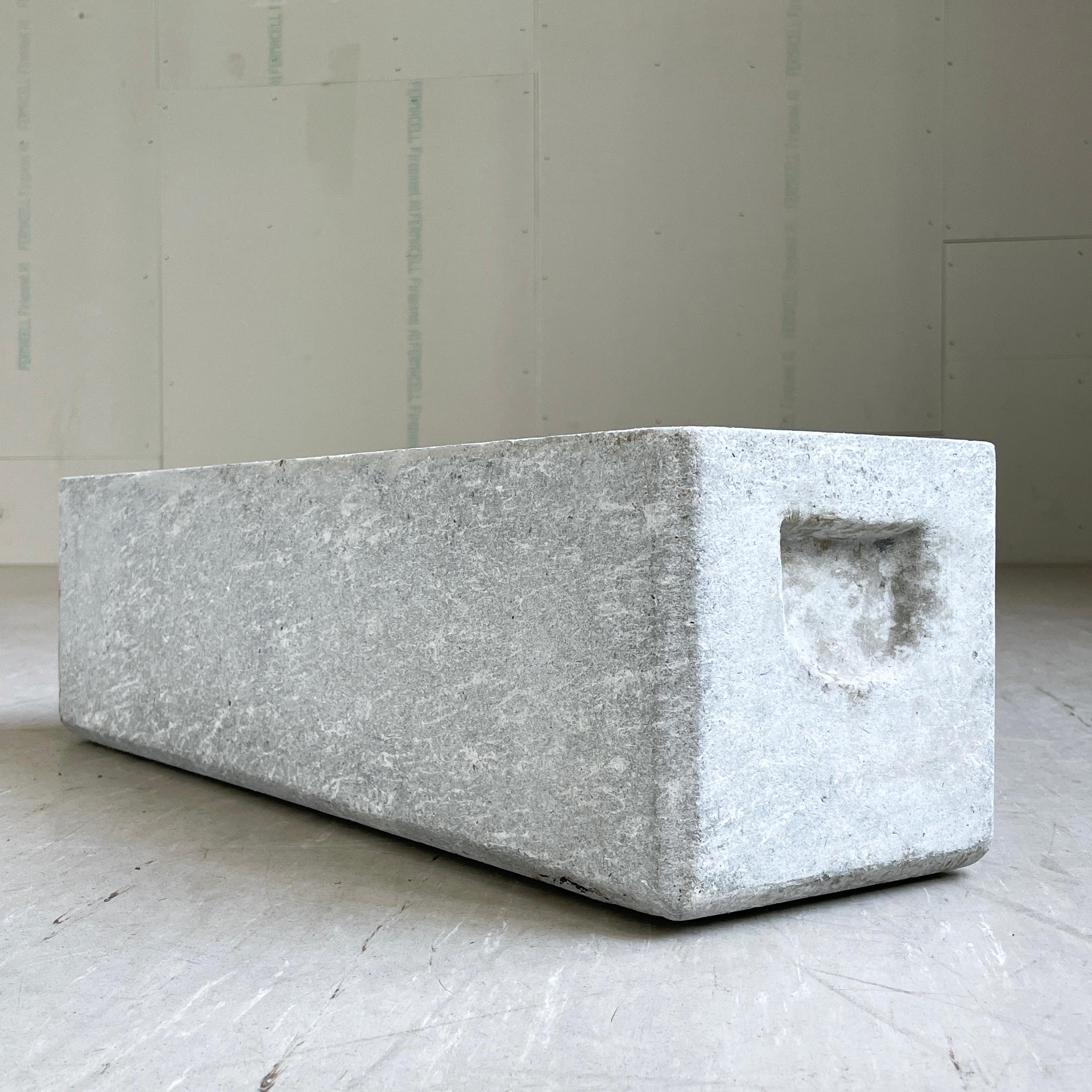 Minimalist concrete planter trough by prominent Swiss designer, Willy Guhl. Made in Switzerland ca. 1950 - 1960. Produced by Eternit AG, Switzerland. Solid concrete with drainage holes. With original recessed handles.
In original condition with