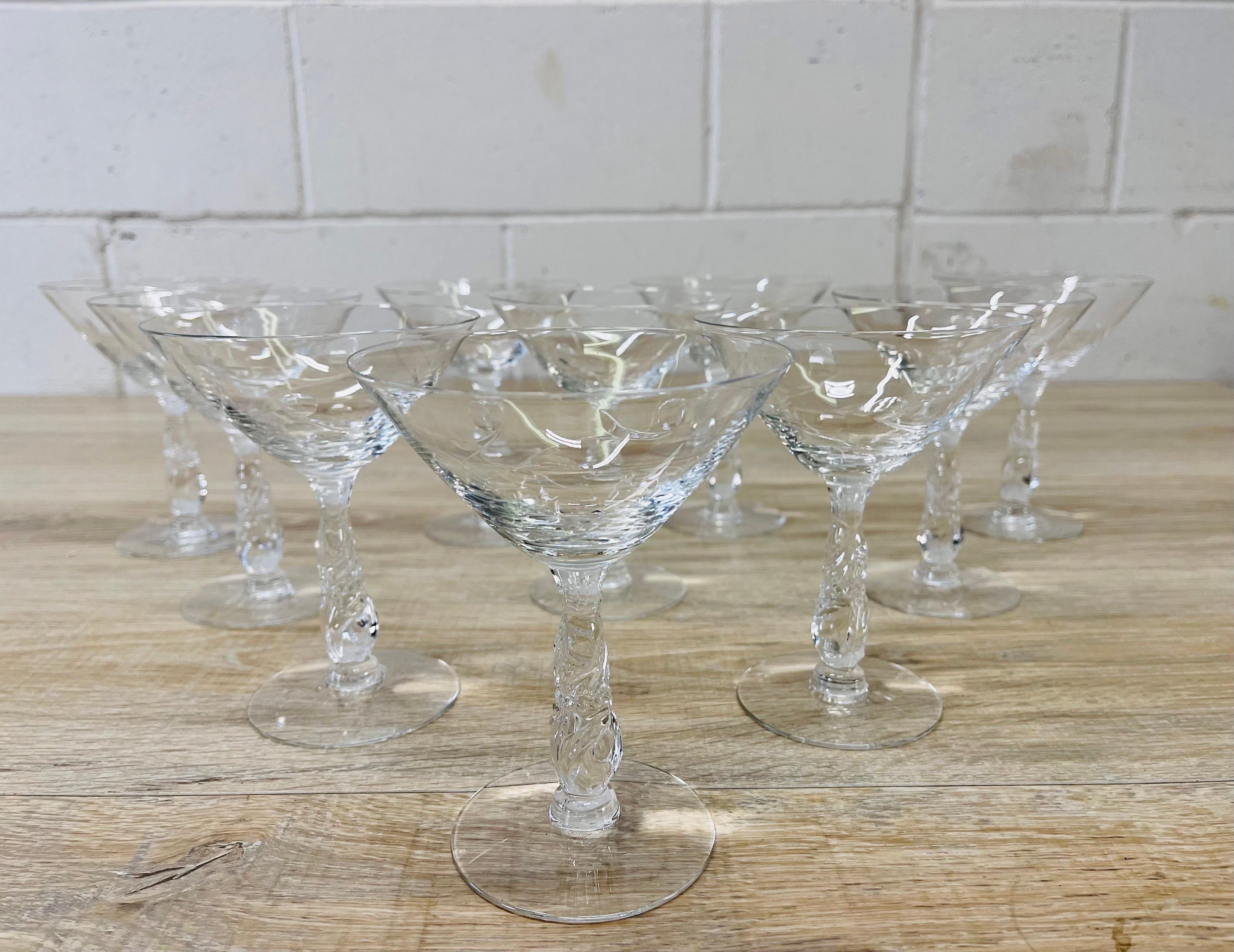 Vintage 1950s set of ten mitre cut glass clear coupe stems. No marks.