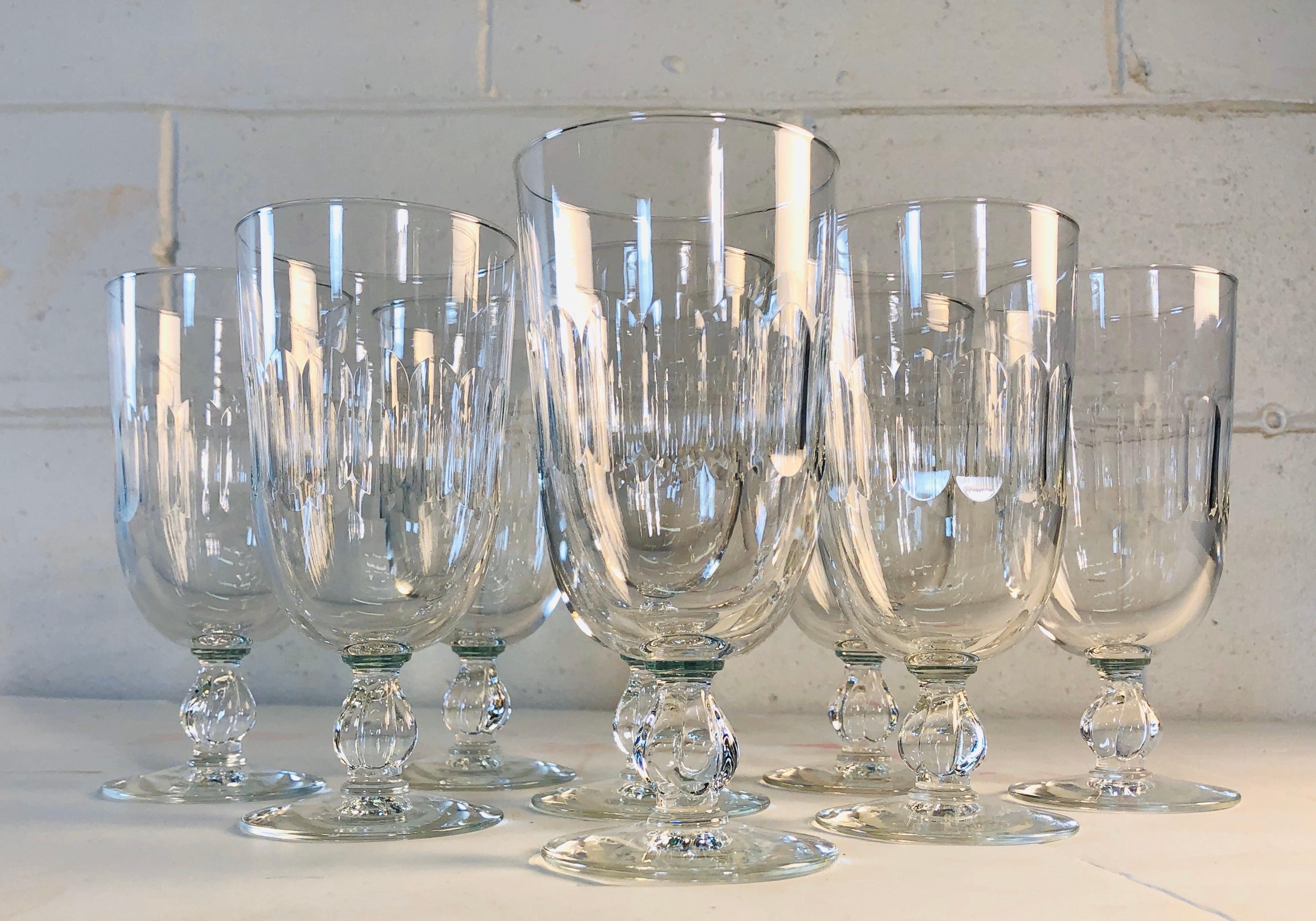 Vintage 1950s set of 8 mitred glass water stems. All handcut and polished. No marks. Excellent condition.