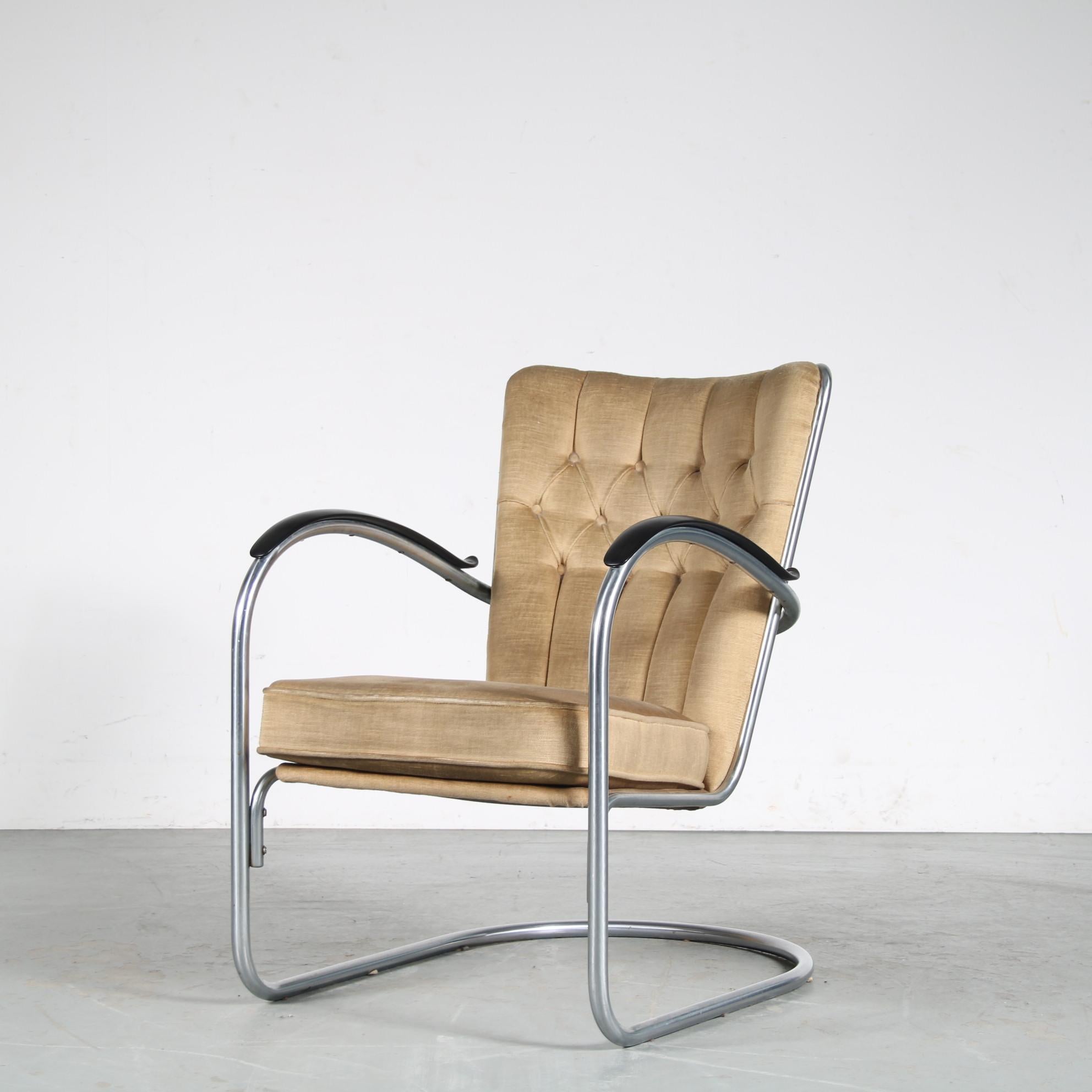 A lovely easy chair from the Netherlands, manufactured by Gispen and designed by W.H. Gispen around 1950.

This chair, model “412”, is an iconic Dutch design and highly recognizable Gispen piece. The chrome plated, tubular metal frame gives it a