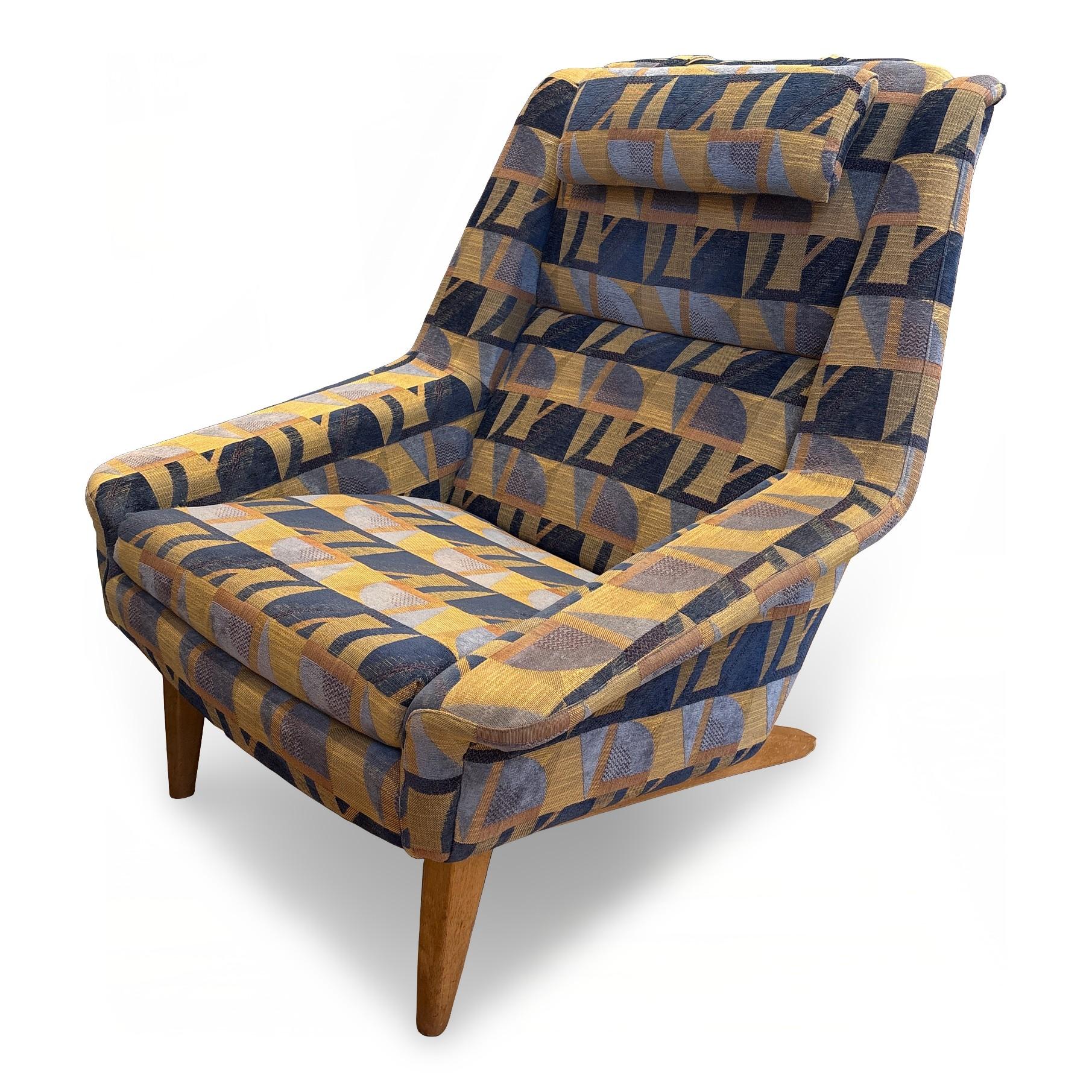 1960s Model 4410 lounge chair designed by Folke Ohlsson for Fritz Hansen, Denmark. Swedish designer Folke Ohlsson produced this striking lounge chair, model 4410, and ottoman for Danish manufacturer Fritz Hansen in 1957. The chair's wide angular