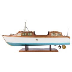Antique 1950's model of a motor boat named Rainbow