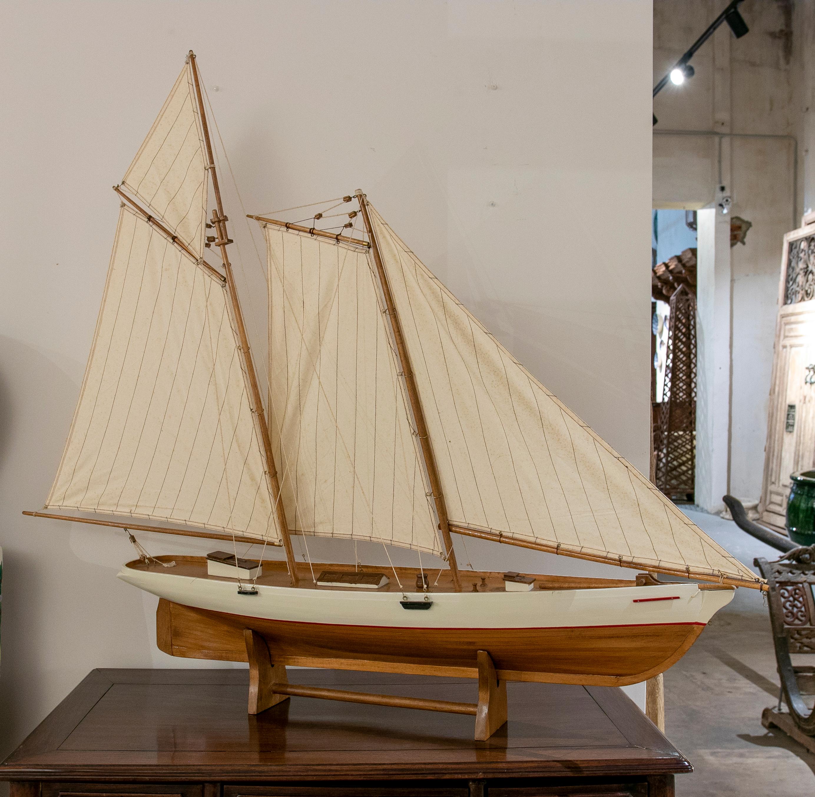 1950s Model of a wooden boat with sails.