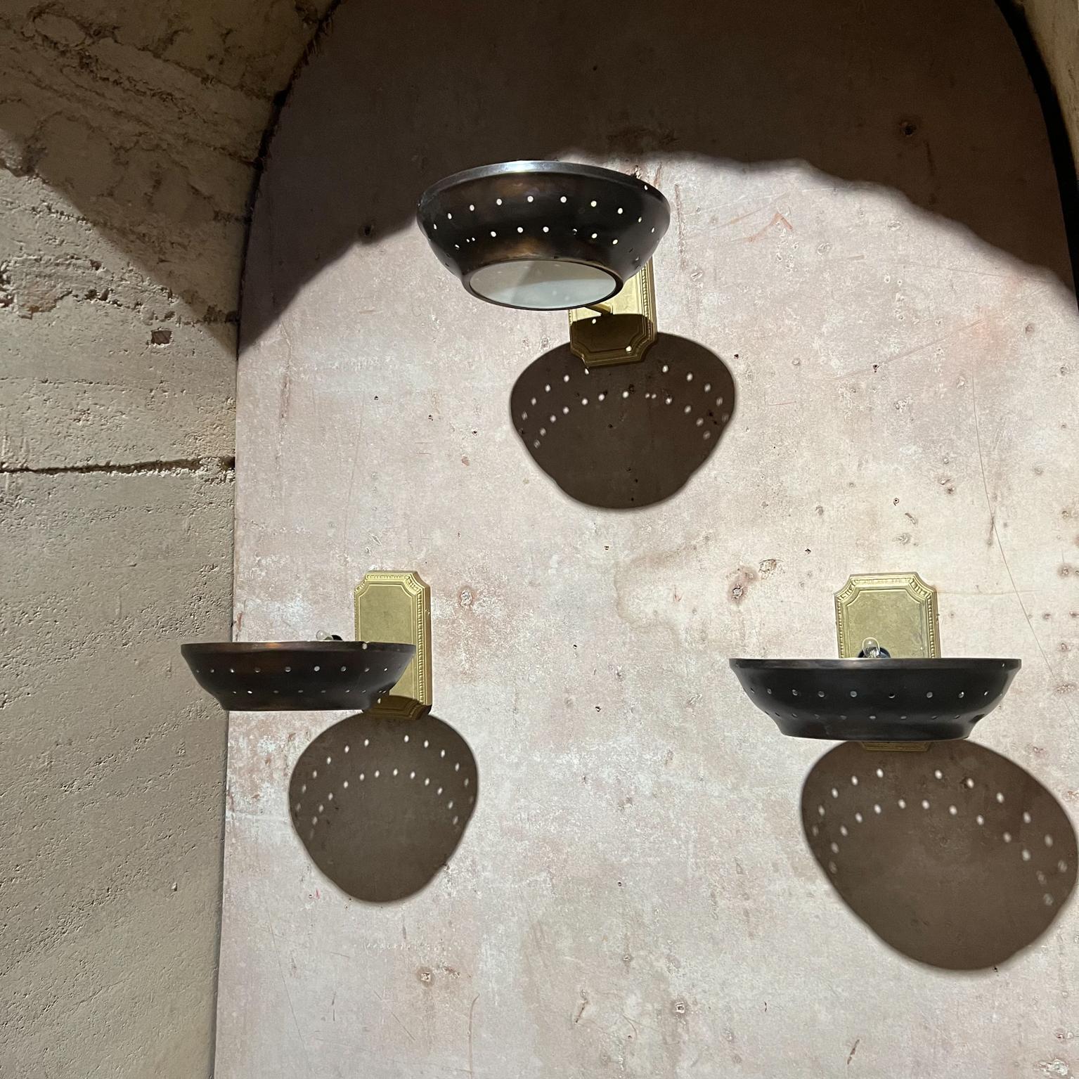 1950s Modern Atomic Three Patinated Brass Wall Sconces Perforated Round Shade For Sale 7