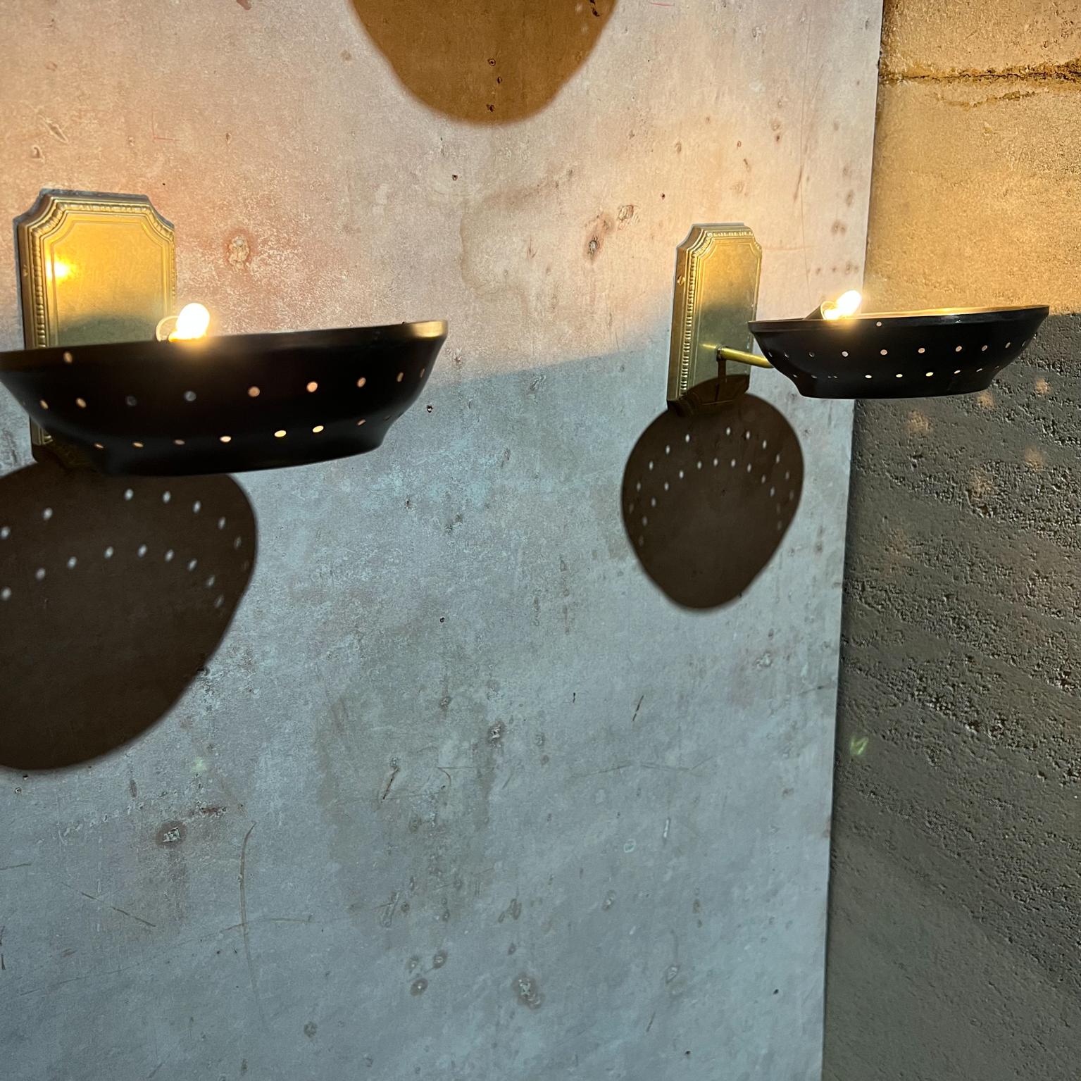 Mid-20th Century 1950s Modern Atomic Three Patinated Brass Wall Sconces Perforated Round Shade For Sale