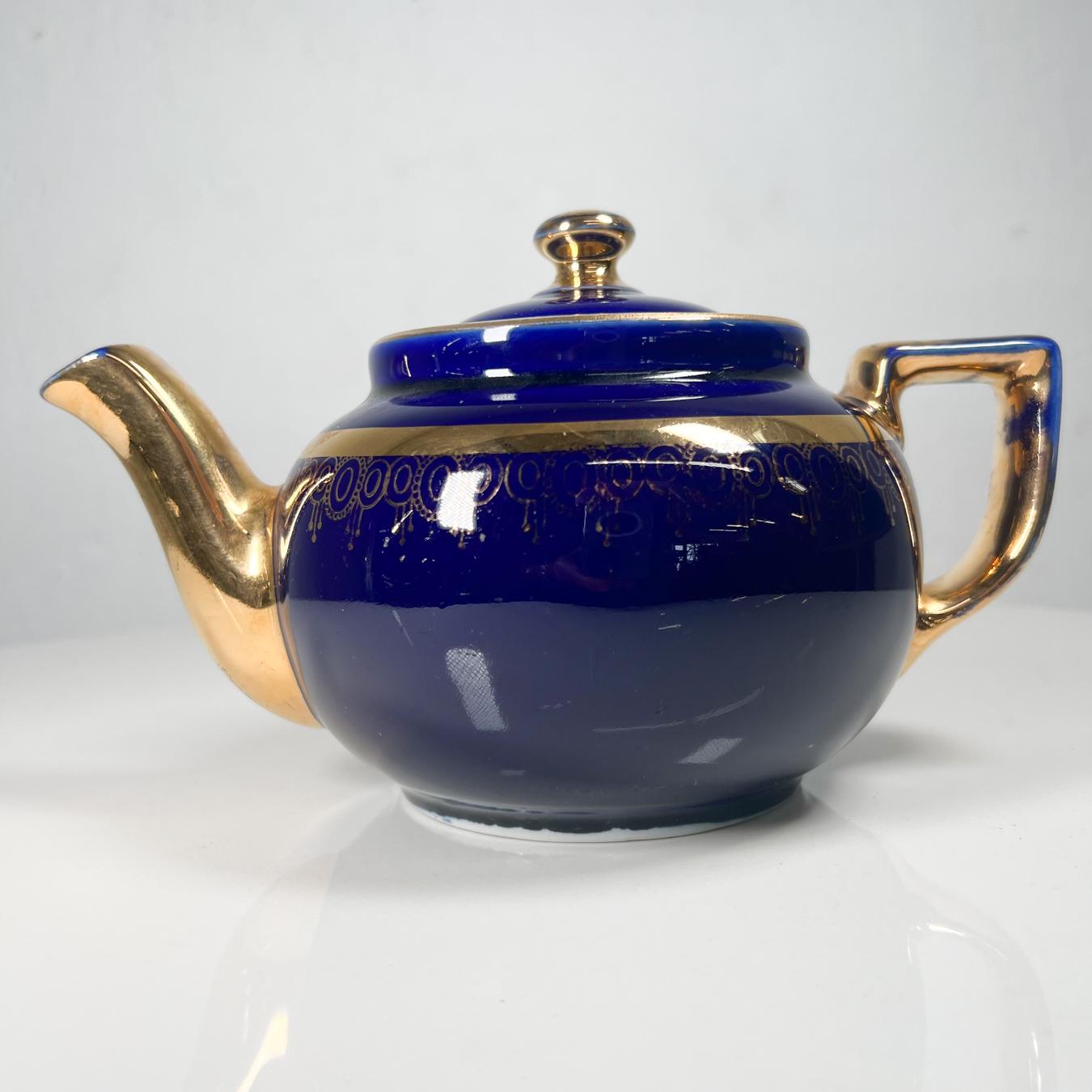 hall blue teapot gold trim