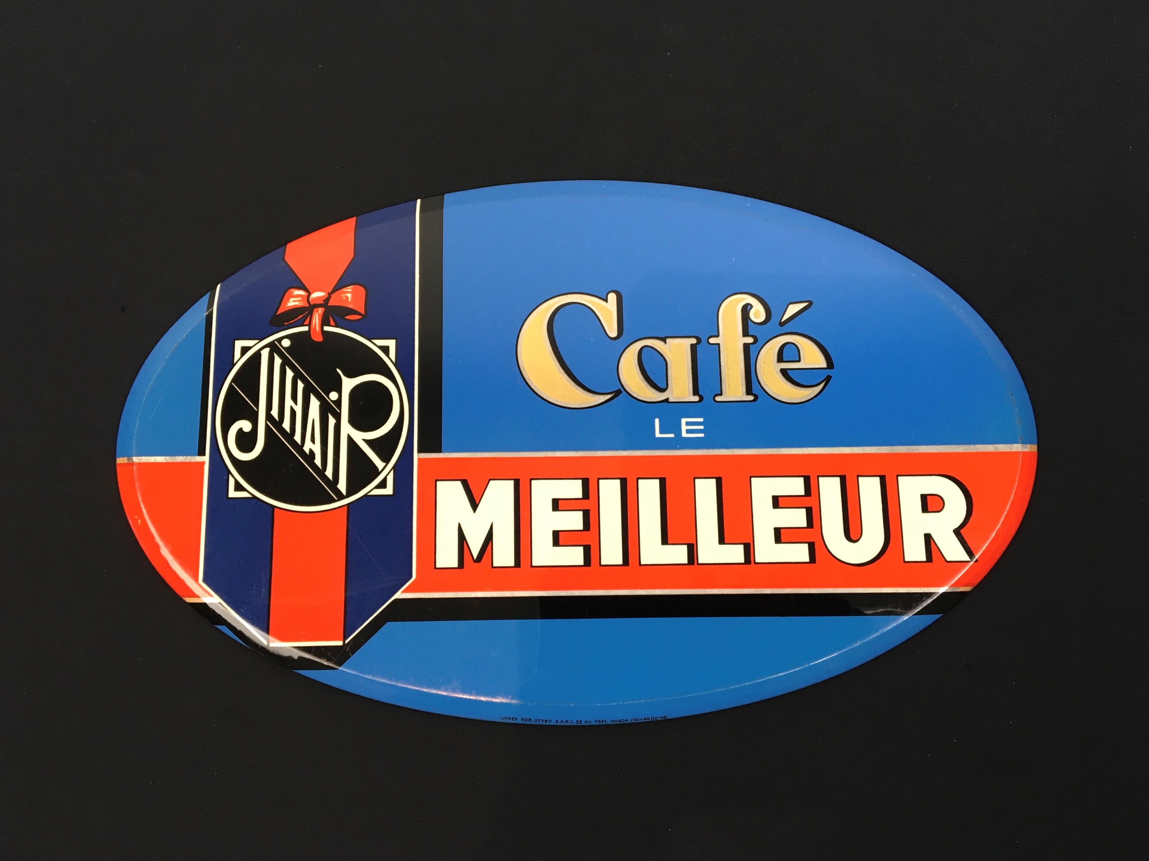 1950s French wall sign for coffee. 
Great wall decoration in modern style; a sign in bright blue color with a red band and a kind of ribbon with the Jihair logo on. 
This oval wall sign was designed for the French coffee brand Jihair Coffee: