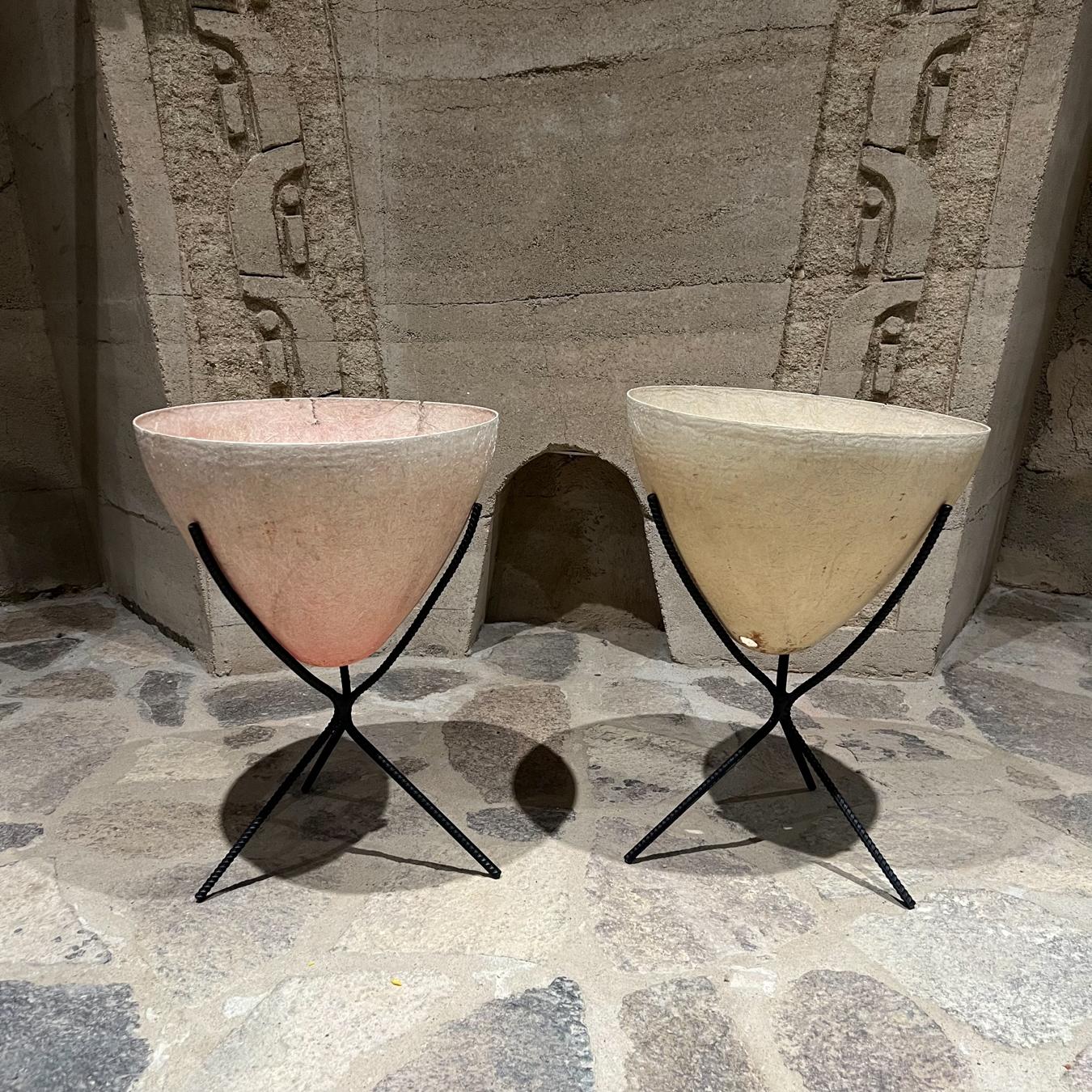 1950s Modern Kimball fiberglass bullet cone planter set 
Listing is for 2 vintage planters with base.
20 tall x 15.25 diameter
Fiberglass in original vintage preowned condition. Distressed.
Sun faded cracks and holes. Not new.
No label.
Wear &