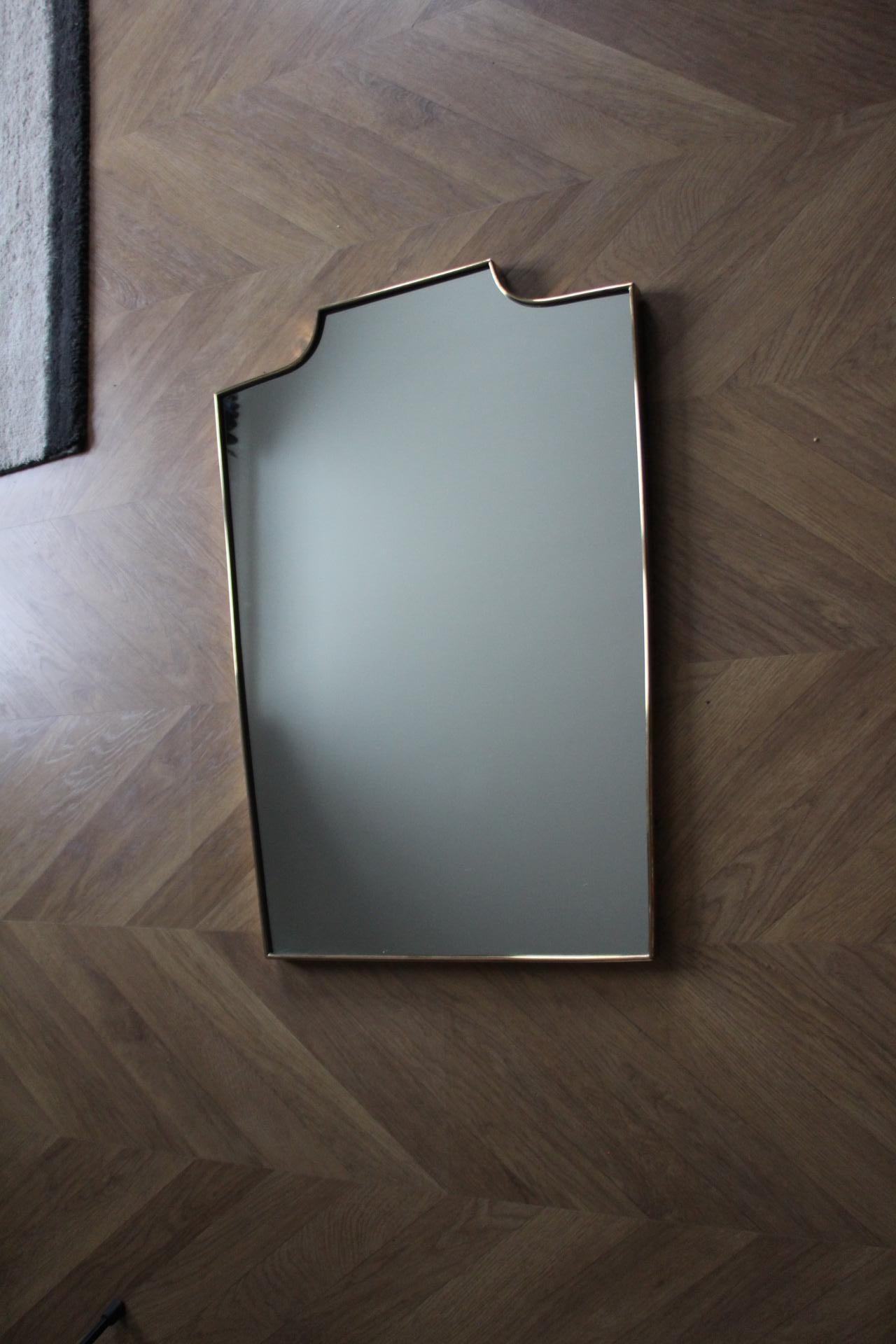 Mid-20th Century 1950's Modernist Shaped Brass Wall Mirror For Sale