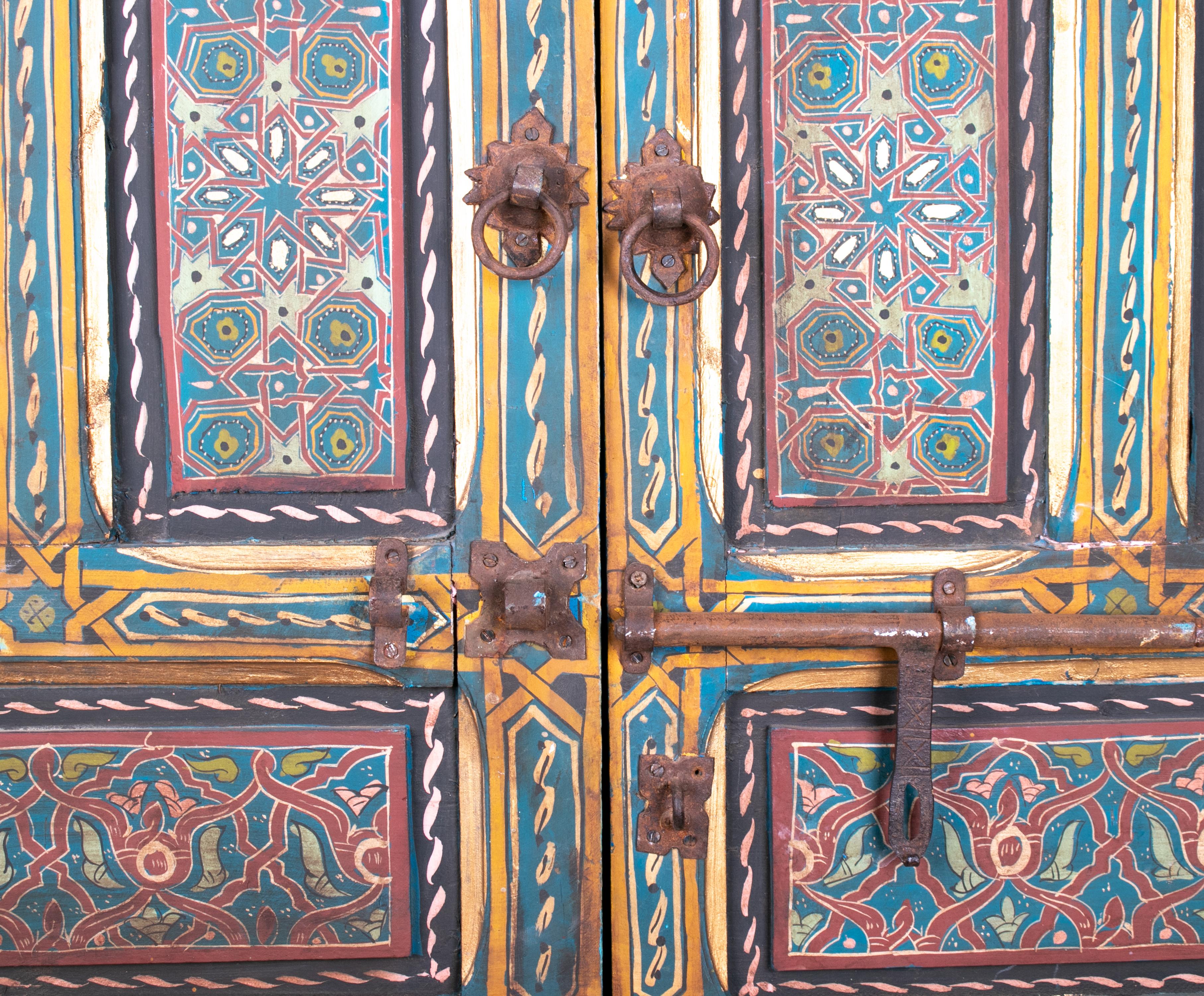 1950s Moroccan hand painted two-leaf door with iron lock.