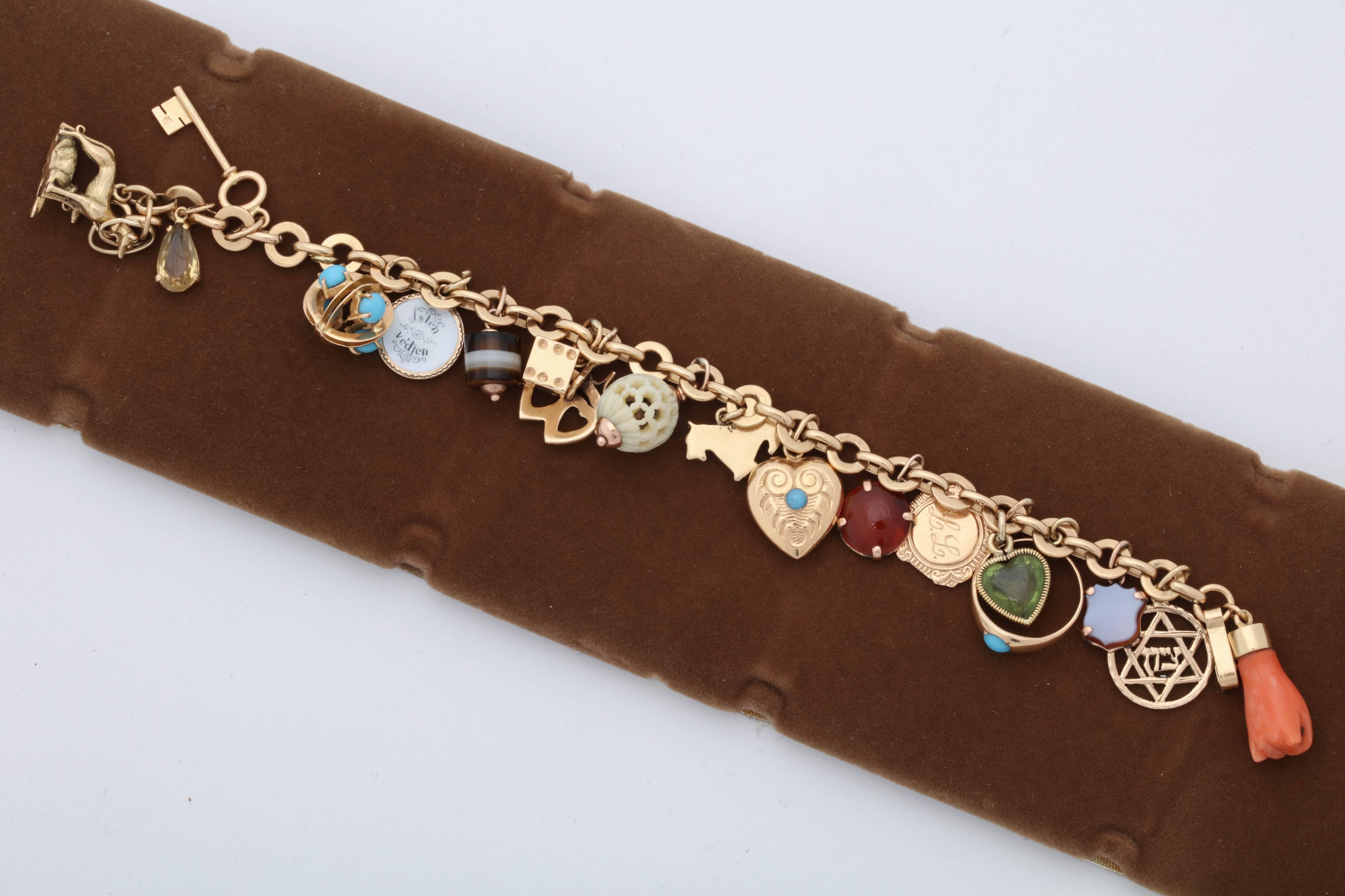 1950s Multicolored Stones 20 Lucky Charms Gold Link Bracelet In Good Condition In New York, NY