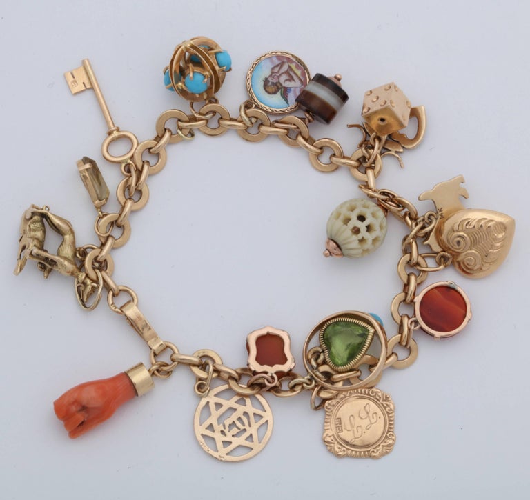 1950s Multicolored Stones 20 Lucky Charms Gold Link Bracelet at 1stDibs