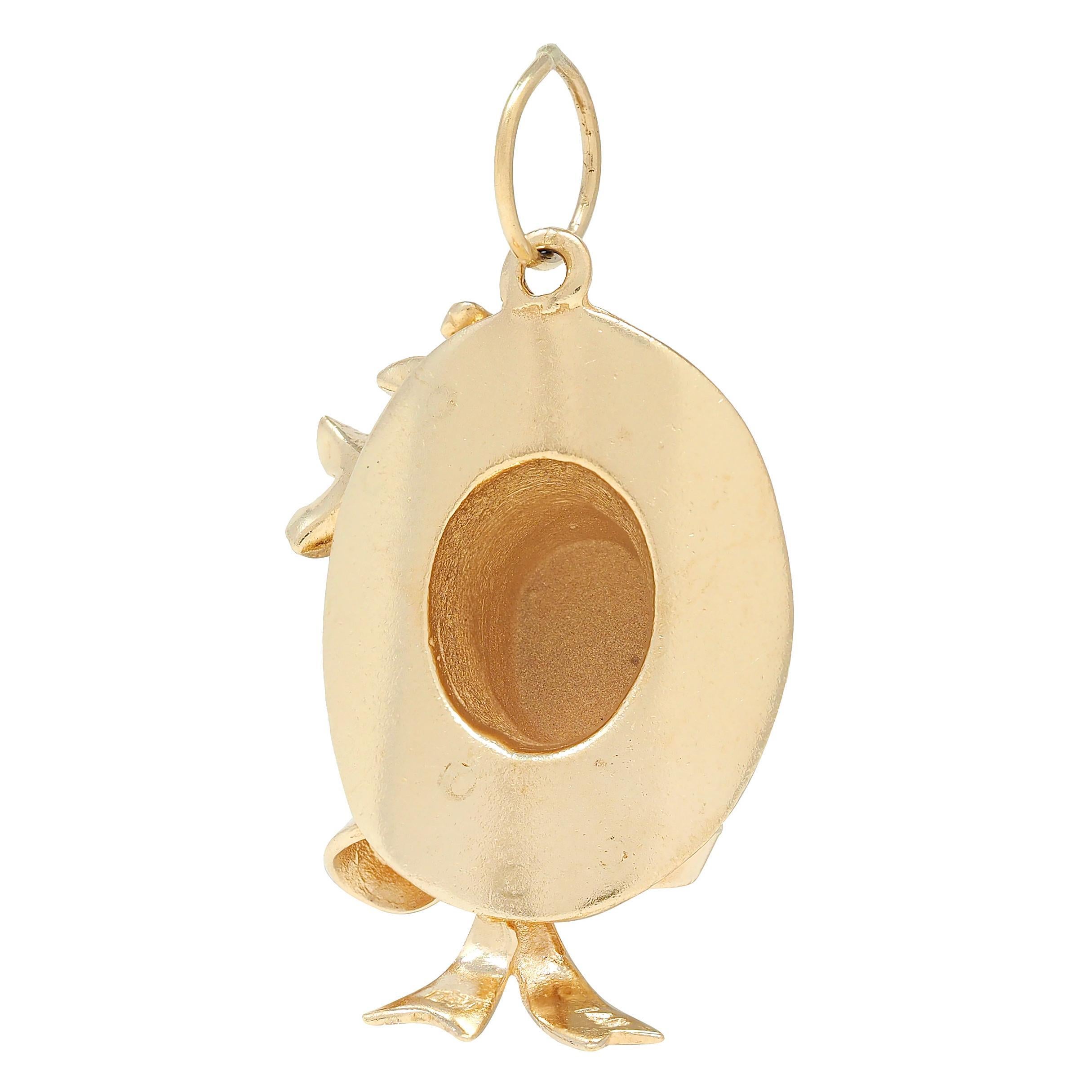Designed as a dimensional sunhat with wide brim and bow with flaring tails
Grooved with fabric detail and adorned with floral appliqué
Accented by prong set round cut sapphire and ruby
Round cut and each measuring 2.0 mm round
Transparent dark blue