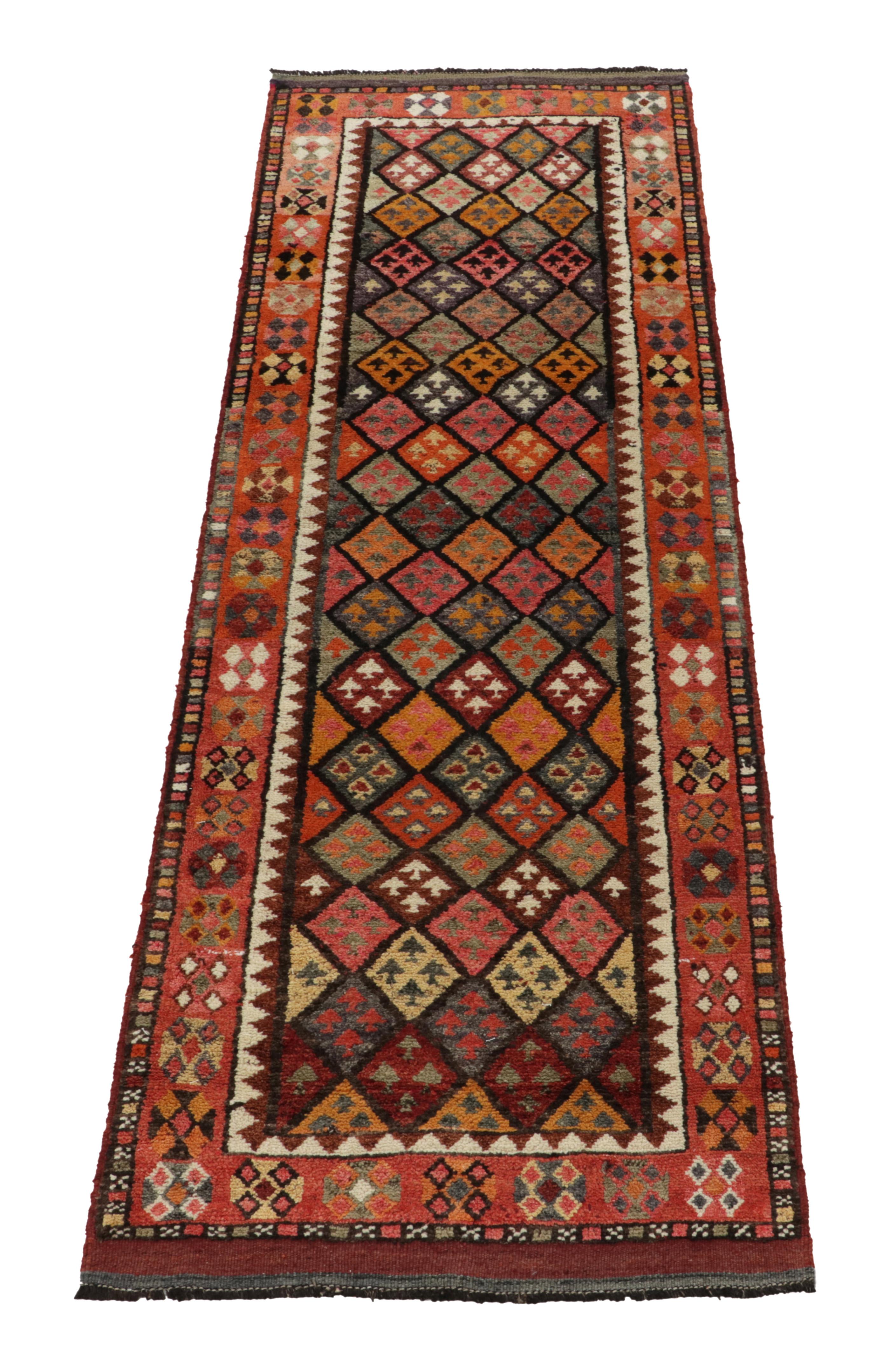 Hand-knotted in wool, a 3x9 runner from Rug & Kilim’s latest curation of bold, rare tribal pieces. 

Originating from Turkey circa 1950-1960, the sketch enjoys diamond patterns on the field outlined by traditional motifs in rich tones of warm red,