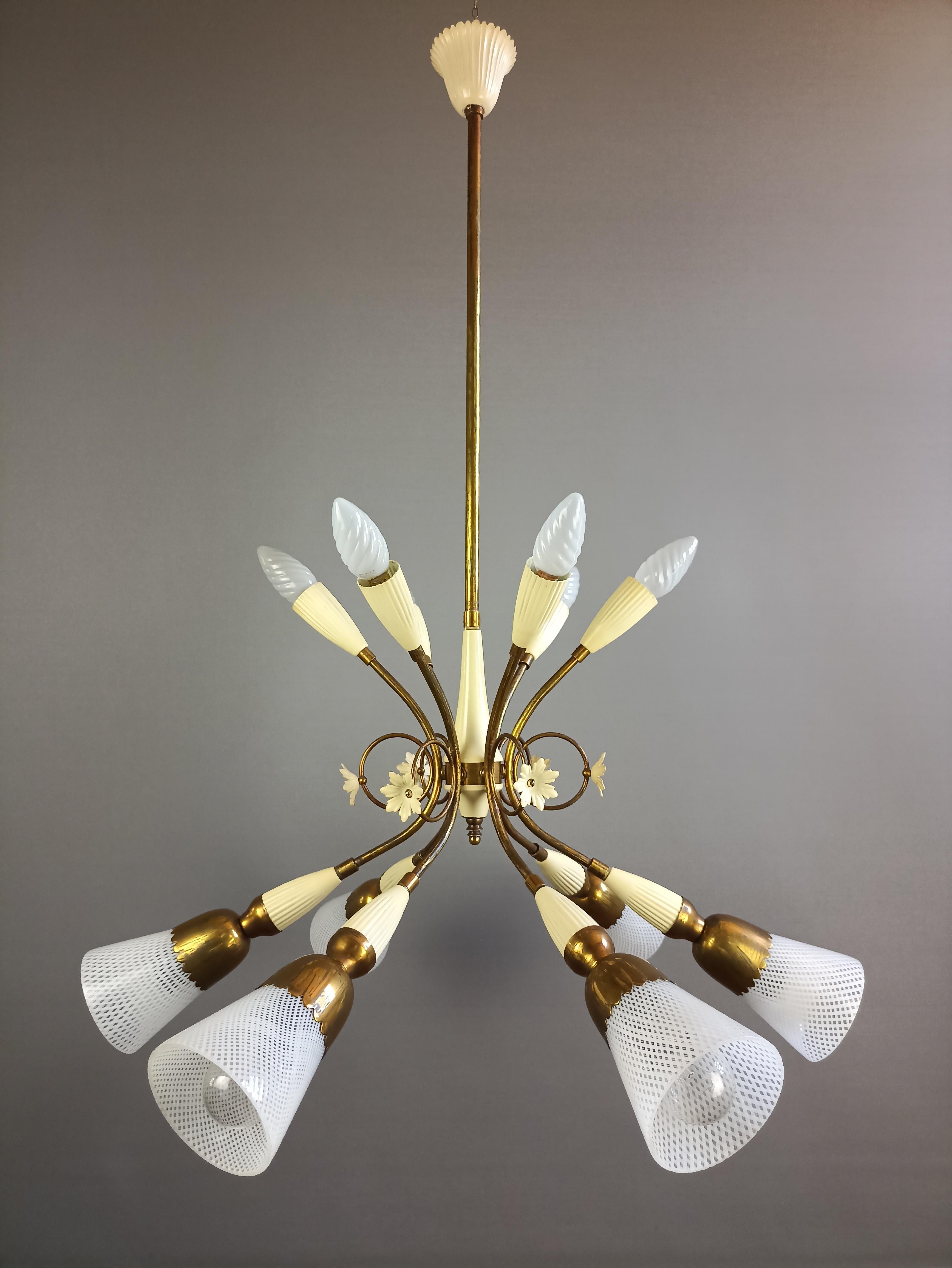 Aluminum 1950s Murano glass and gilt brass twelve-light Italian chandelier. For Sale